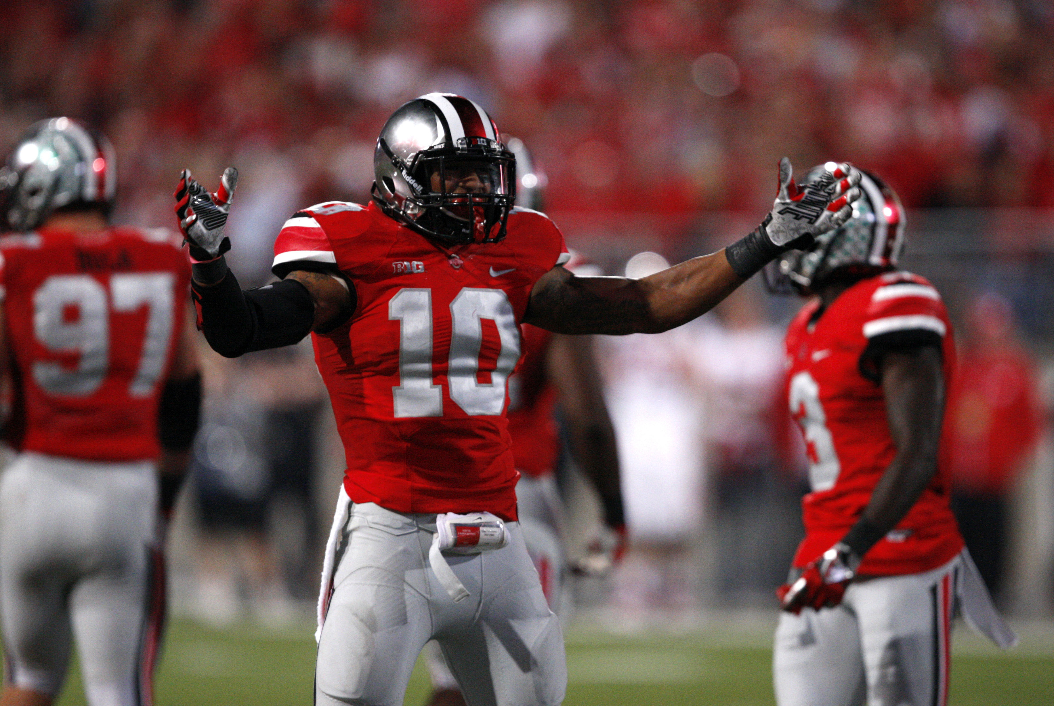Sep 28, 2013; Columbus, OH, USA; Ohio State Buckeyes linebacker Ryan Shazier (10) pumps up the crowd during the fourth quarter against the Wisconsin Badgers at Ohio Stadium. Buckeyes beat the Badgers 31-24. Mandatory Credit: Raj Mehta-USA TODAY Sports