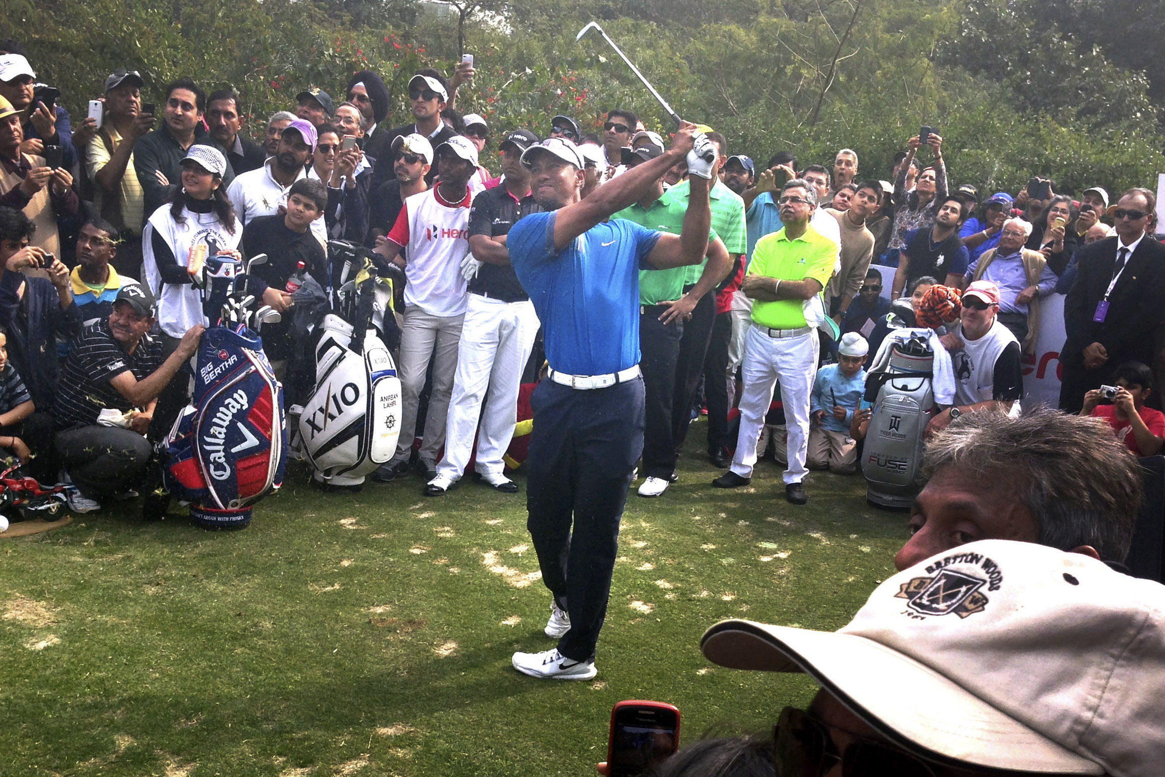 Tiger Woods tees off at Delhi Golf Club in New Delhi, India, Tuesday, Feb. 4, 2014. Woods arrived Monday on his first visit to India to play an exhibition with a top business executive. (AP Photo)