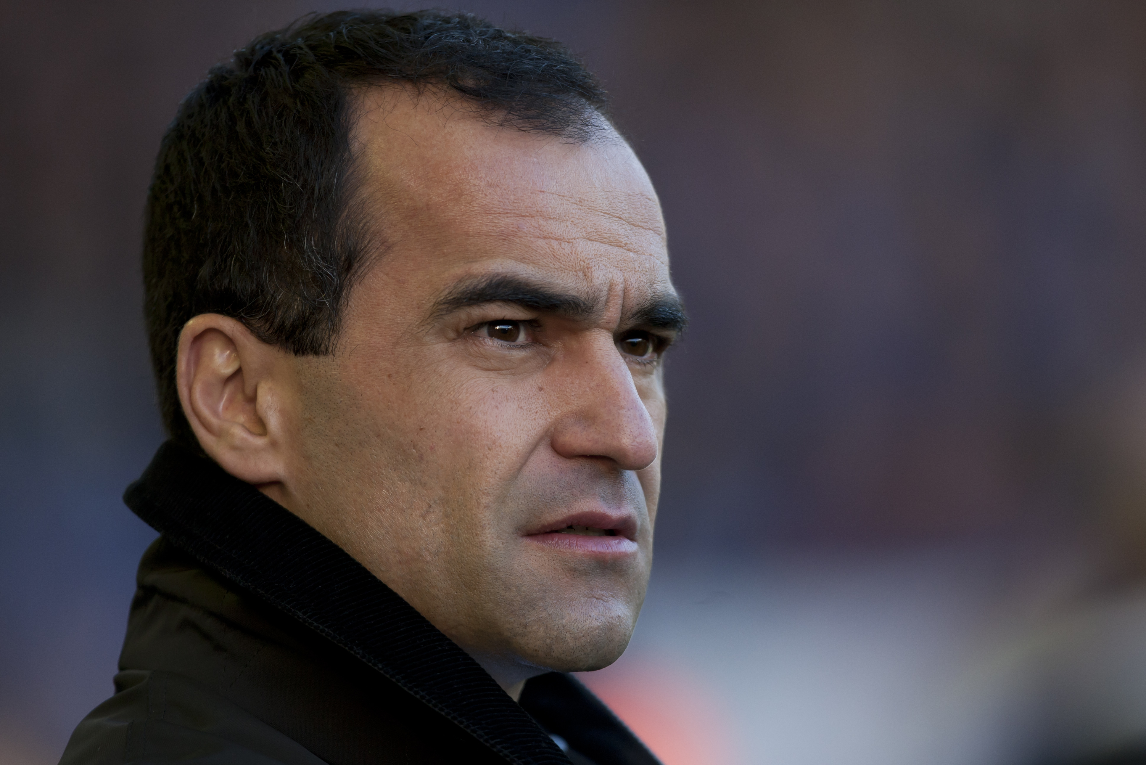 Everton's manager Roberto Martinez takes to the touchline before his team's English Premier League soccer match against Southampton at Goodison Park Stadium, Liverpool, England, Sunday Dec. 29, 2013. (AP Photo/Jon Super)