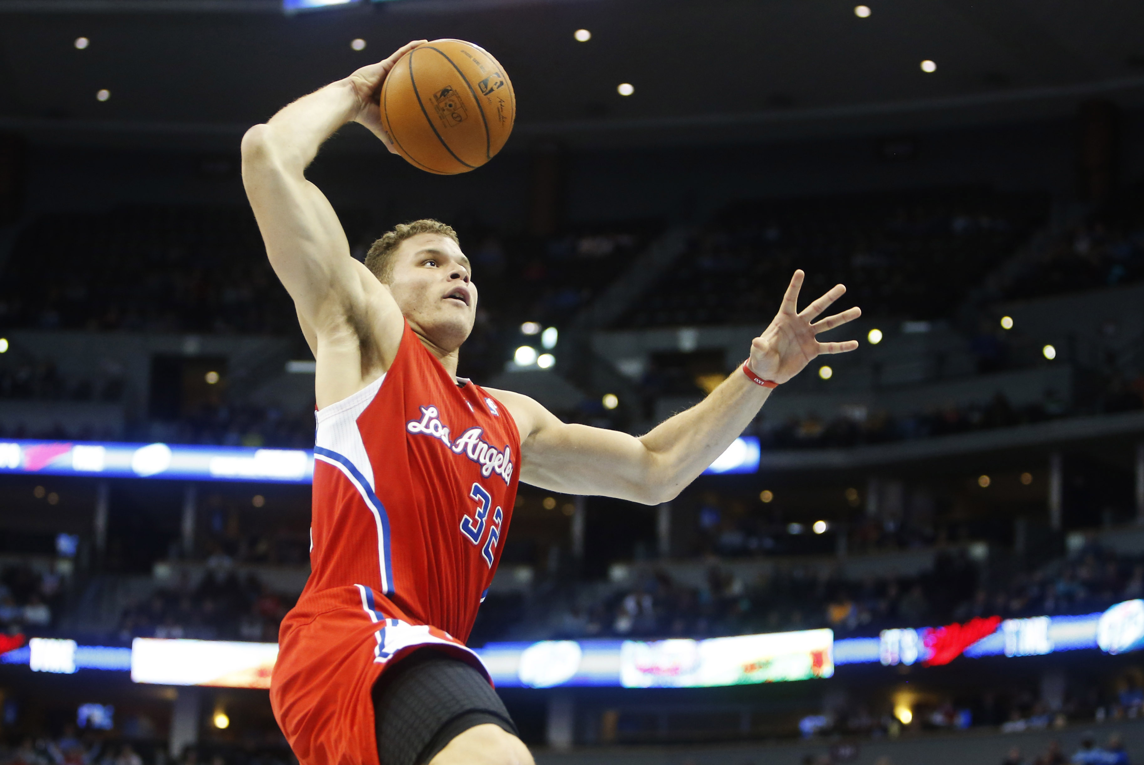 Feb 3, 2014; Denver, CO, USA; Los Angeles Clippers forward Blake Griffin (32) dunks the ball during the second half against the Denver Nuggets at Pepsi Center. The Nuggets won 116-115.  Mandatory Credit: Chris Humphreys-USA TODAY Sports