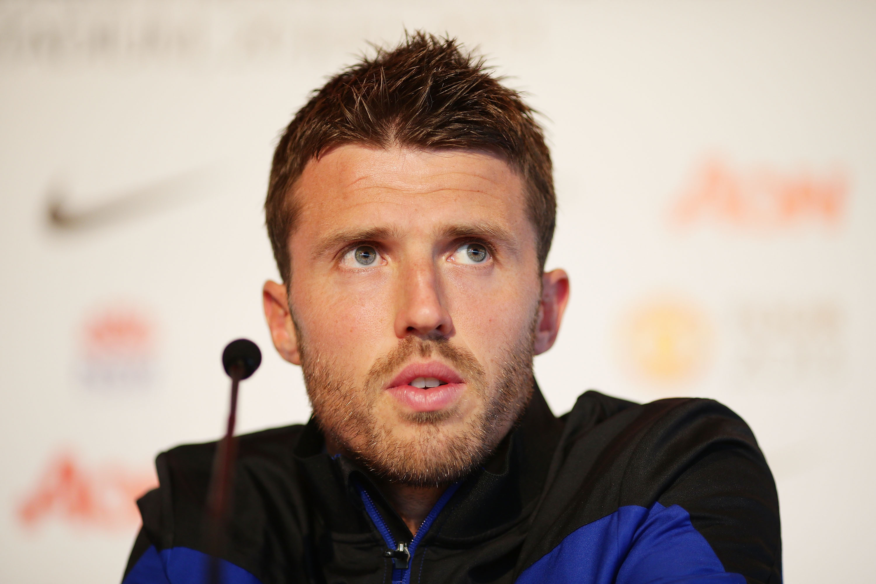 SYDNEY, AUSTRALIA - JULY 19:  Michael Carrick speaks to the media during a Manchester United press conference at Museum of Contemporary Art on July 19, 2013 in Sydney, Australia.  (Photo by Matt King/Getty Images)