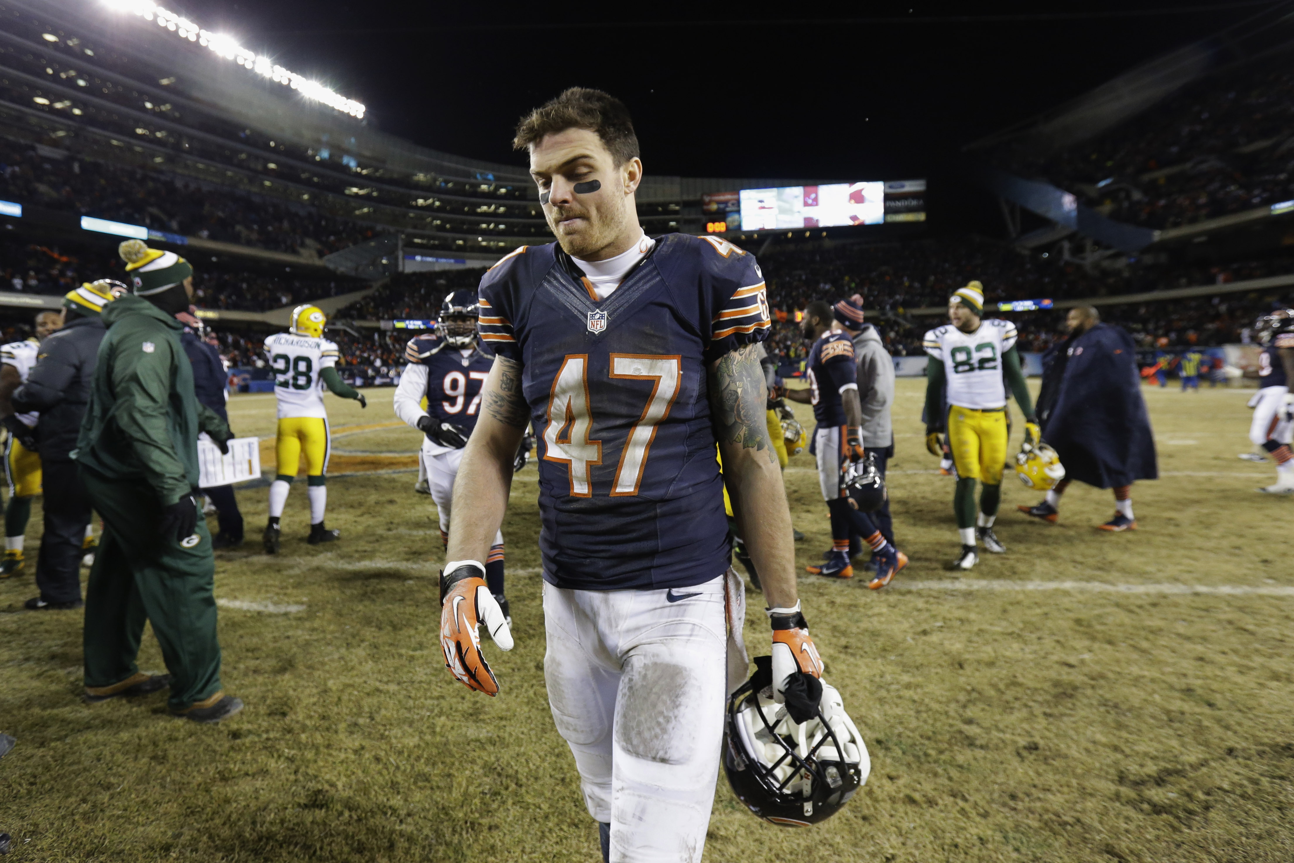 Chicago Bears safety Chris Conte (47) walks off the field after the Bears' 33-28 loss to the Green Bay Packers in an NFL football game, Sunday, Dec. 29, 2013, in Chicago. (AP Photo/Nam Y. Huh)