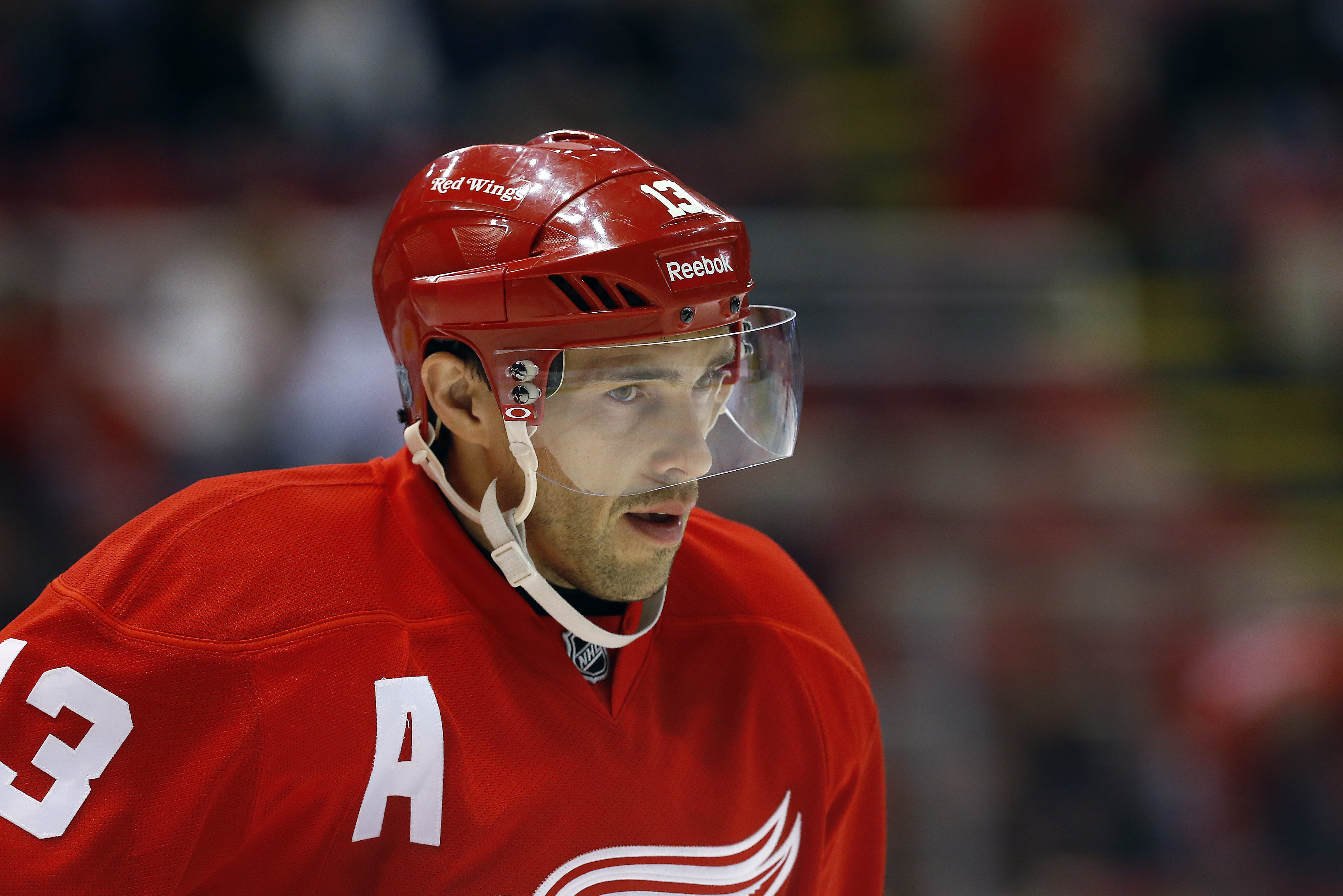 Detroit Red Wings center Pavel Datsyuk (13), of Russia, skates against the Dallas Stars in the first period of an NHL hockey game in Detroit Thursday, Nov. 7, 2013. (AP Photo/Paul Sancya)