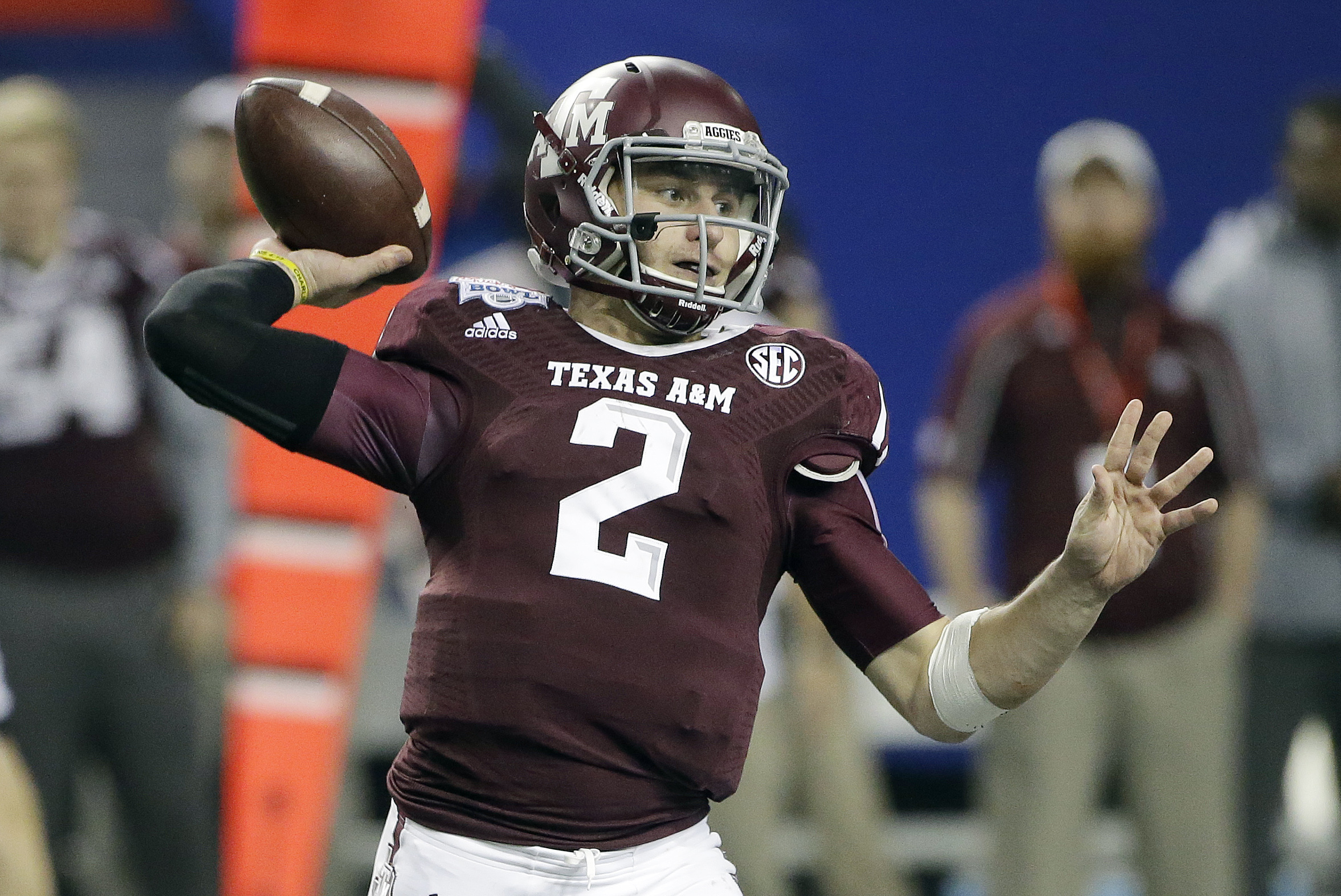 Texas A&M quarterback Johnny Manziel (2) looks for a receiver in the second half of the Chick-fil-A Bowl NCAA college football game against Duke Tuesday, Dec. 31, 2013, in Atlanta. (AP Photo/John Bazemore)