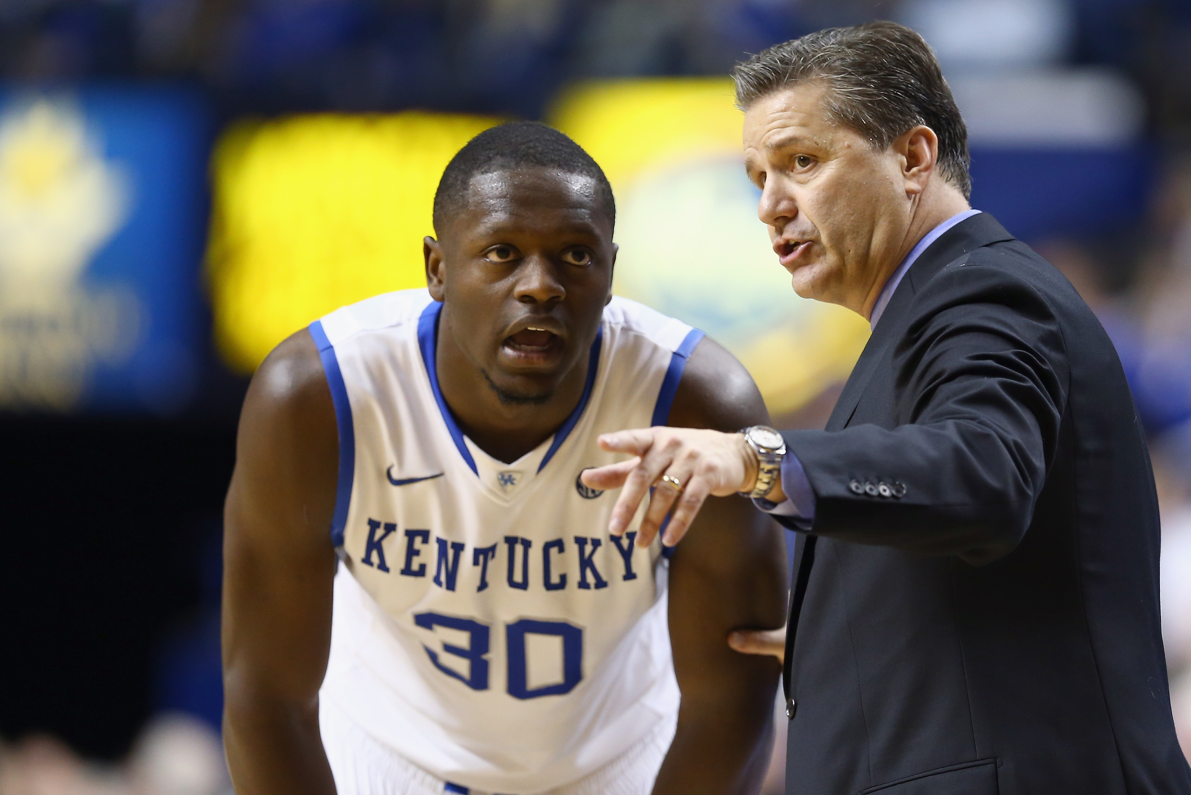 LEXINGTON, KY - FEBRUARY 04:  John Calipari the head coach of the Kentucky Wildcats gives instructions to Julius Randle #30 during the game against the Ole Miss Rebels at Rupp Arena on February 4, 2014 in Lexington, Kentucky.  (Photo by Andy Lyons/Getty Images)