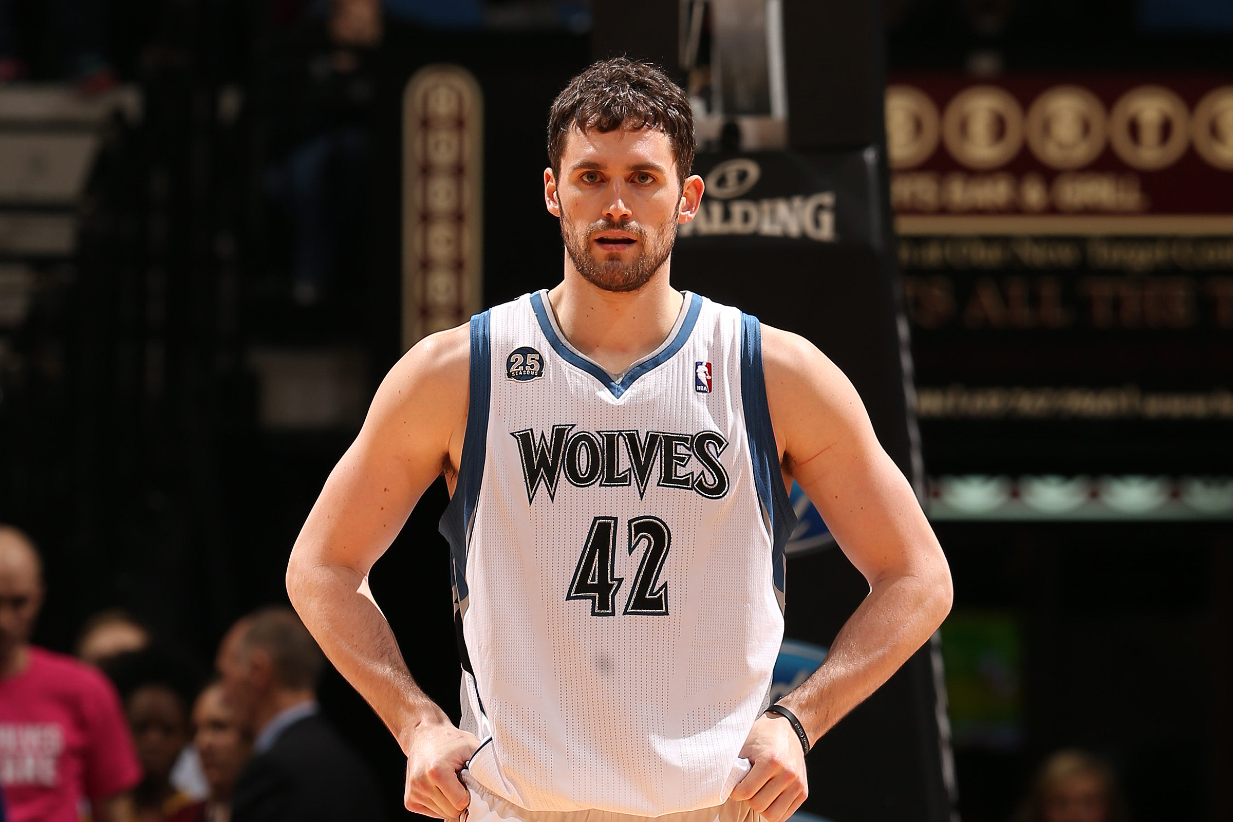 MINNEAPOLIS, MN - JANUARY 18: Kevin Love #42 of the Minnesota Timberwolves stands on the court against the Utah Jazz on January 18, 2014 at Target Center in Minneapolis, Minnesota. NOTE TO USER: User expressly acknowledges and agrees that, by downloading and or using this Photograph, user is consenting to the terms and conditions of the Getty Images License Agreement. Mandatory Copyright Notice: Copyright 2014 NBAE (Photo by Jordan Johnson/NBAE via Getty Images)