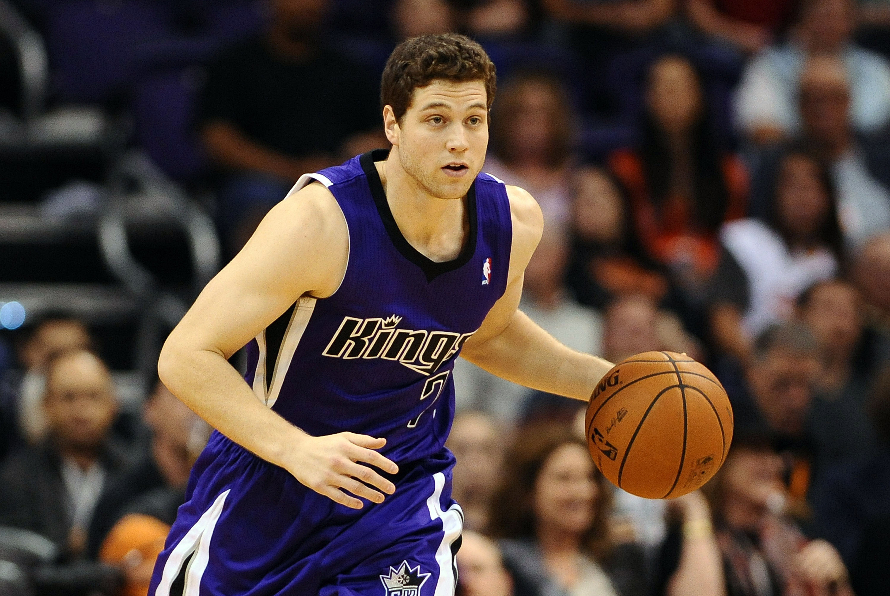Nov 20, 2013; Phoenix, AZ, USA; Sacramento Kings guard Jimmer Fredette (7) dribbles the ball up the court in the second half of the game against the Phoenix Suns at US Airways Center. The Kings defeated the Suns 113-106. Mandatory Credit: Jennifer Stewart-USA TODAY Sports