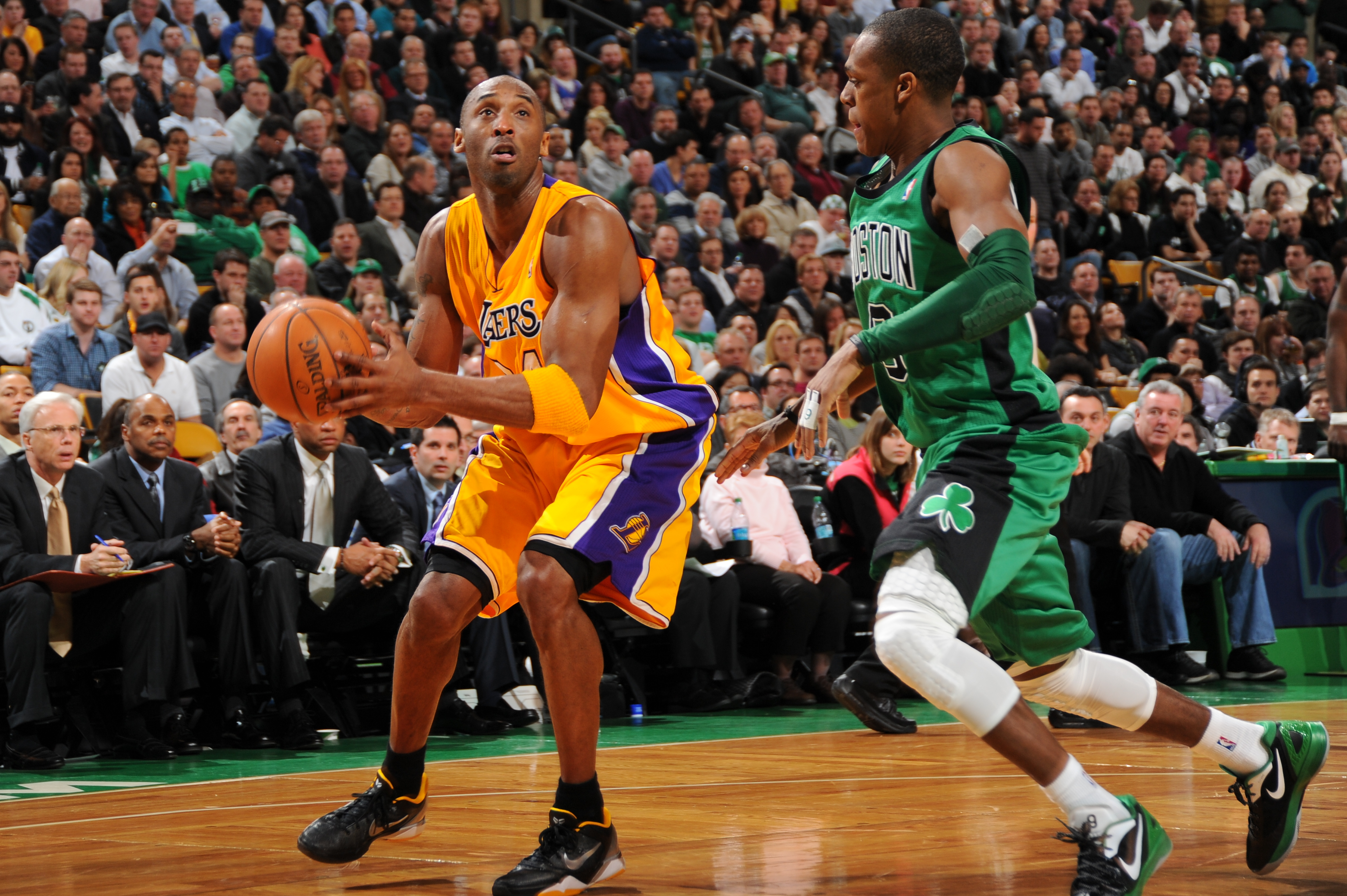 BOSTON, MA - FEBRUARY 9: Kobe Bryant #24 of the Los Angeles Lakers controls the ball against Rajon Rondo #9 of the Boston Celtics on February 9, 2012 at the TD Garden in Boston, Massachusetts. NOTE TO USER: User expressly acknowledges and agrees that, by downloading and or using this photograph, User is consenting to the terms and conditions of the Getty Images License Agreement. Mandatory Copyright Notice: Copyright 2012 NBAE  (Photo by Brian Babineau/NBAE via Getty Images)