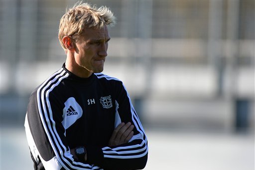 Leverkusen's head coach Sami Hyypia looks on during his team's training session  in Leverkusen, Germany,  Tuesday Oct. 22, 2013. Bayer 04 Leverkusen will face FC Shakhtar Donetsk in the UEFA Champions League group A soccer match on Wednesday. (AP Photo/dpa, Jan-Philipp Strobel)