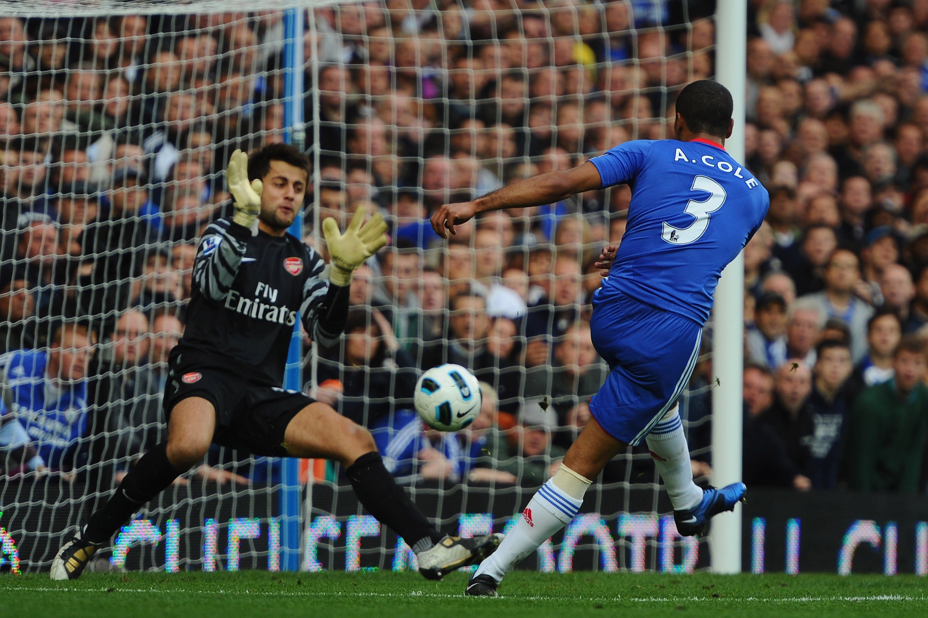 LONDON, ENGLAND - OCTOBER 03:  Ashley Cole of Chelsea shoots past Lukasz Fabianski of Arsenal but sees his 'goal' disallowed for offside during the Barclays Premier League match between Chelsea and Arsenal at Stamford Bridge on October 3, 2010 in London, England.  (Photo by Mike Hewitt/Getty Images)