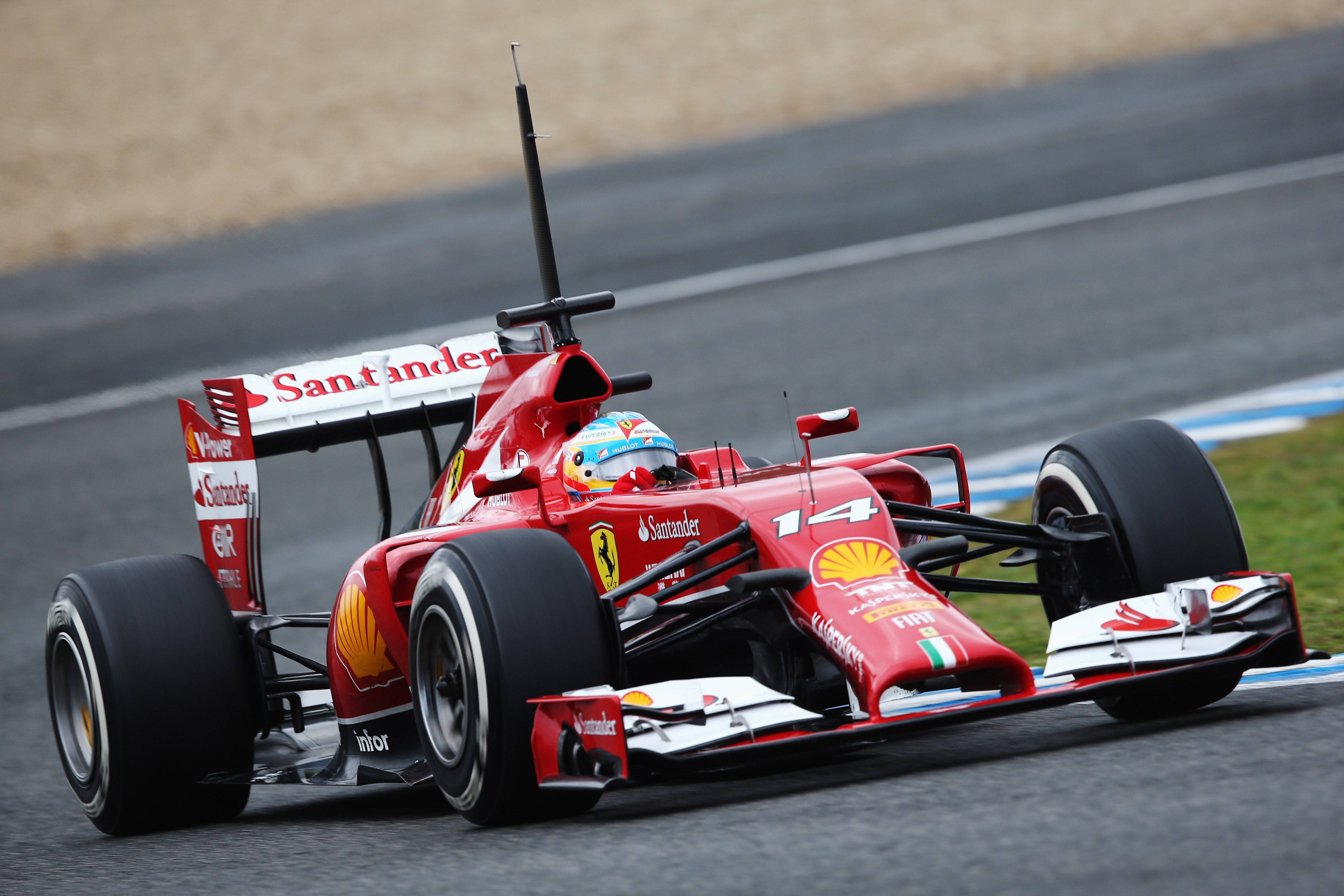 JEREZ DE LA FRONTERA, SPAIN - JANUARY 31:  Fernando Alonso of Spain and Ferrari drives during day four of Formula One Winter Testing at the Circuito de Jerez on January 31, 2014 in Jerez de la Frontera, Spain.  (Photo by Mark Thompson/Getty Images)