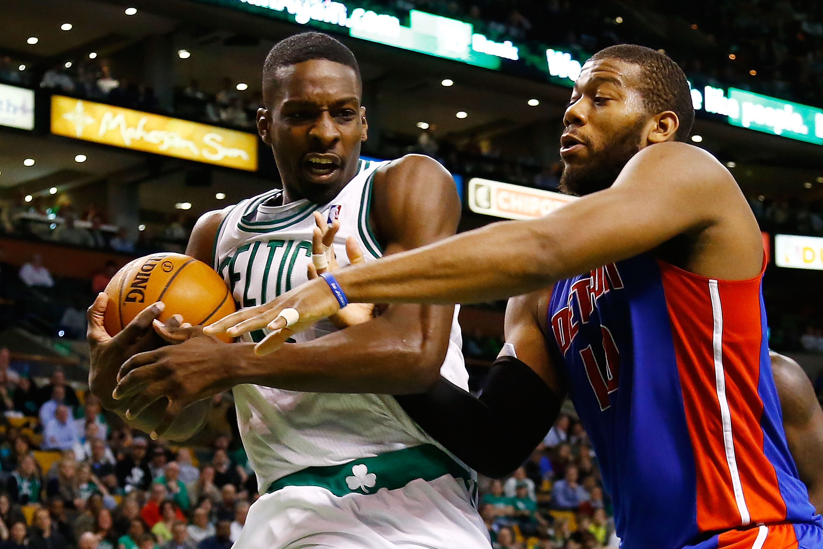 BOSTON, MA - APRIL 3:  Jeff Green #8 of the Boston Celtics secures a loose ball against Greg Monroe #10 of the Detroit Pistons during the game on April 3, 2013 at TD Garden in Boston, Massachusetts. NOTE TO USER: User expressly acknowledges and agrees that, by downloading and or using this photograph, User is consenting to the terms and conditions of the Getty Images License Agreement. (Photo by Jared Wickerham/Getty Images)
