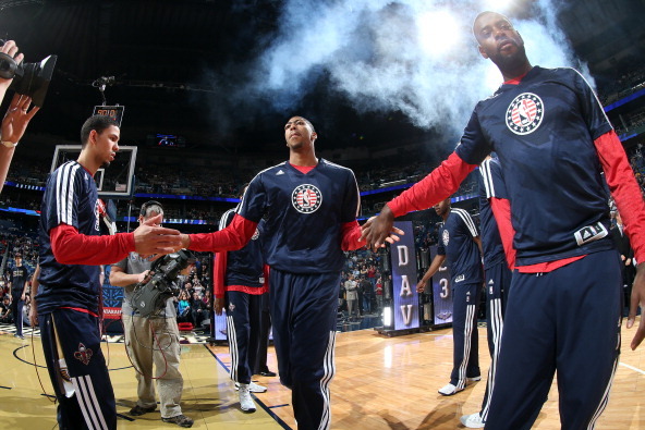 NEW ORLEANS, LA - JANUARY 18: Anthony Davis #23 of the New Orleans Pelicans runs out on the court against the Golden State Warriors during an NBA game on January 18, 2014 at the New Orleans Arena in New Orleans, Louisiana. NOTE TO USER: User expressly acknowledges and agrees that, by downloading and or using this Photograph, user is consenting to the terms and conditions of the Getty Images License Agreement. Mandatory Copyright Notice: Copyright 2014 NBAE (Photo by Layne Murdoch/NBAE via Getty Images)