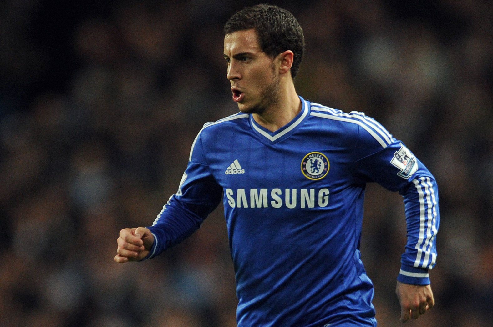 Chelsea's Eden Hazard in action during their English Premier League soccer match against Manchester City at the Etihad stadium in Manchester, England, Monday Feb. 3, 2014. (AP Photo/Clint Hughes)