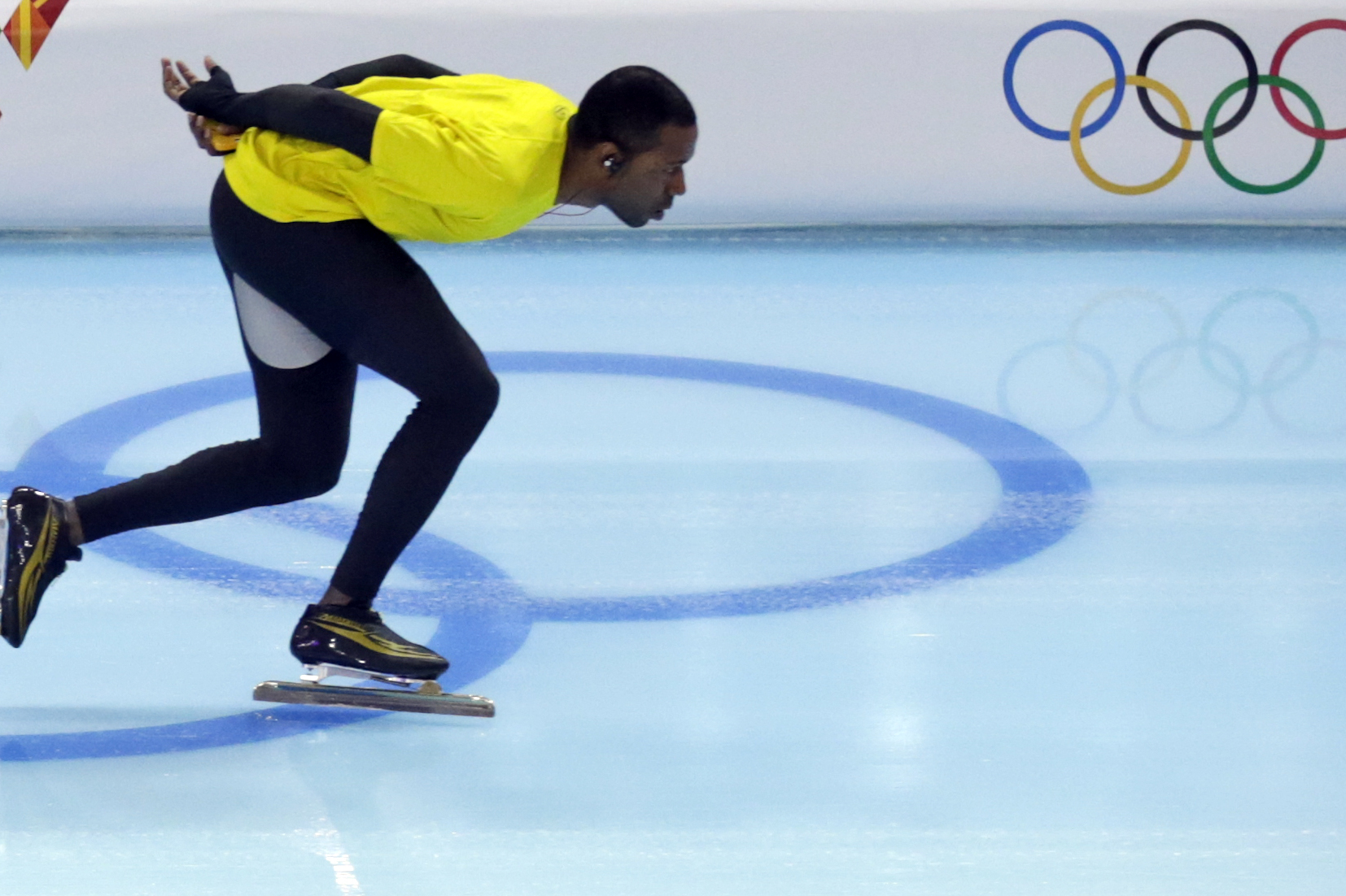 Speedskater Shani Davis of the U.S. trains at the Adler Arena Skating Center during the 2014 Winter Olympics in Sochi, Russia, Wednesday, Feb. 5, 2014. (AP Photo/Matt Dunham)