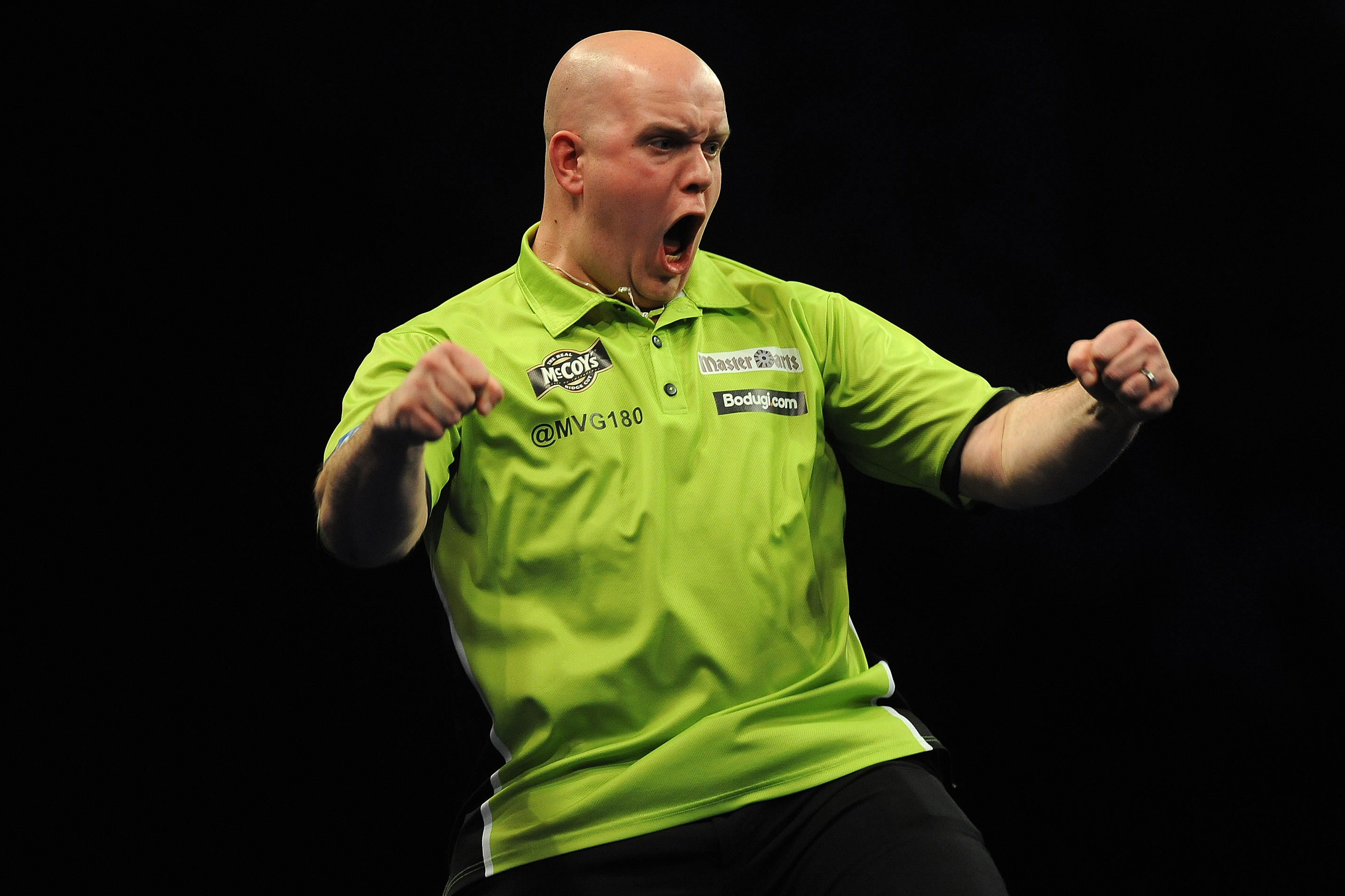 LONDON, ENGLAND - MAY 16: Michael Van Gerwen of Holland celebrates winning The Final against Phill Taylor of England during the McCoy's Premier League Darts Play-Offs at The O2 Arena on May 16, 2013 in London, England. (Photo by Charlie Crowhurst/Getty Images)
