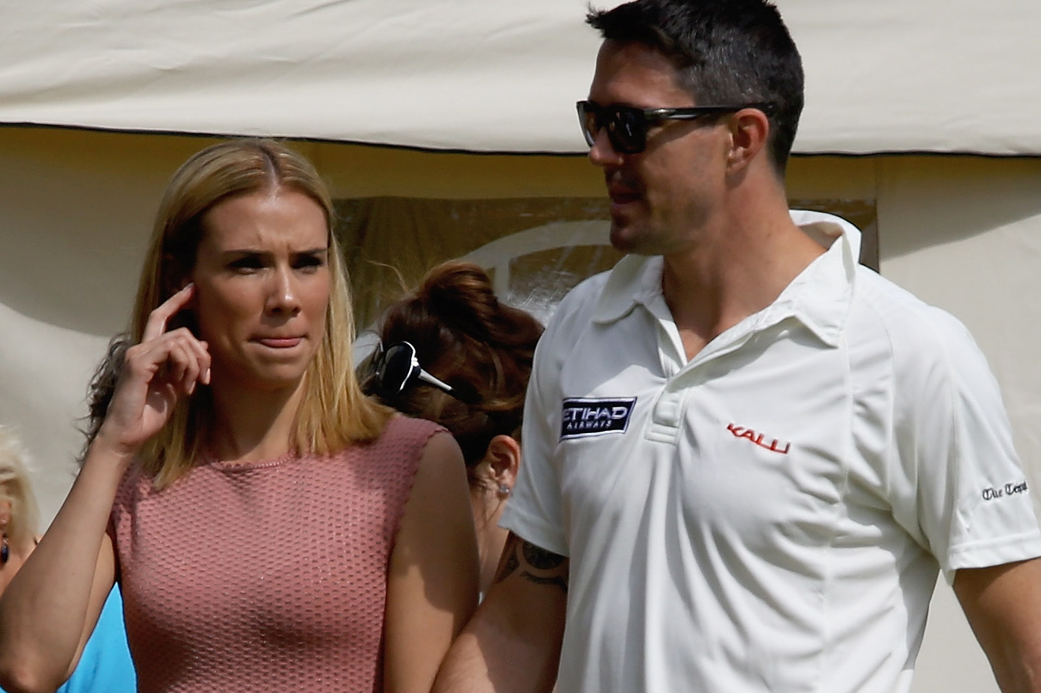 CIRENCESTER, ENGLAND - JUNE 09:  Kevin Pietersen looks on wife his Jessica Taylor during the Shane Warne's Australia vs Michael Vaughan's England T20 match at Circenster Cricket Club on June 9, 2013 in Cirencester, England.  (Photo by Matthew Lewis/Getty Images)
