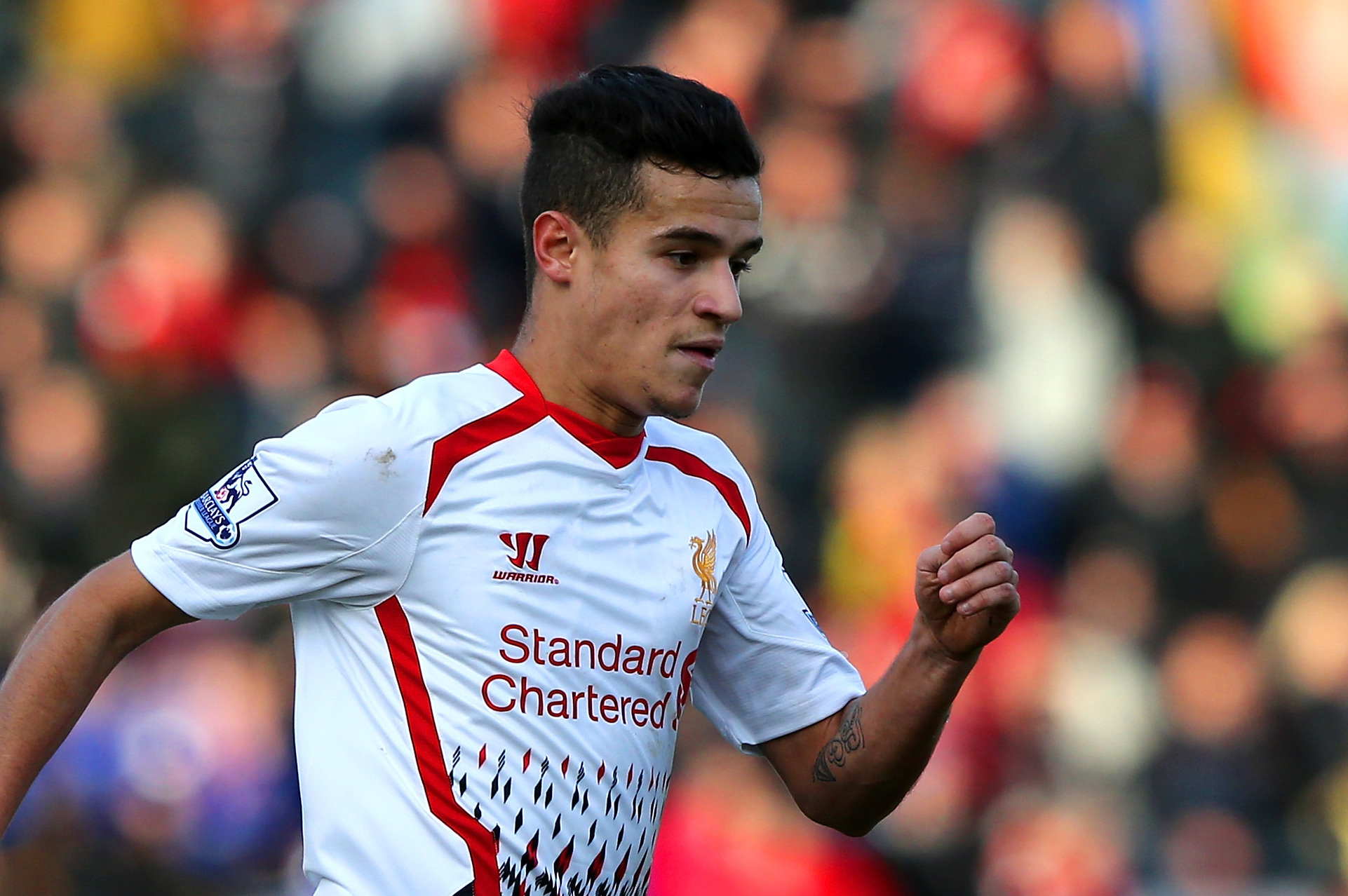 BOURNEMOUTH, ENGLAND - JANUARY 25:  Philippe Coutinho of Liverpool on the ball during the FA Cup Fourth Round match between Bournemouth and Liverpool at Goldsands Stadium on January 25, 2014 in Bournemouth, England.  (Photo by Ian Walton/Getty Images)