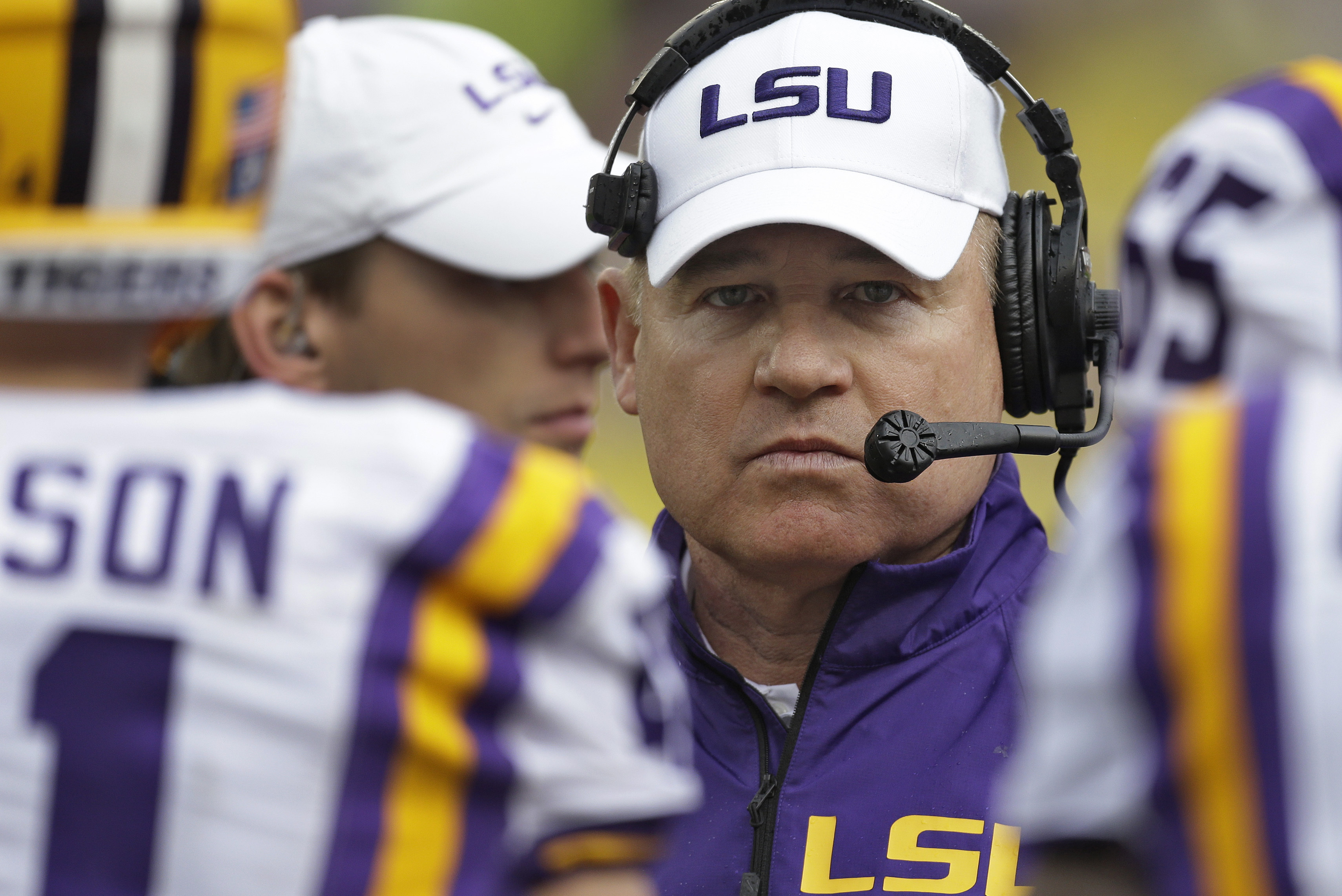 LSU head coach Les Miles talks to his team during the second quarter of the Outback Bowl NCAA college football game against Iowa Wednesday, Jan. 1, 2014, in Tampa, Fla. (AP Photo/Chris O'Meara)