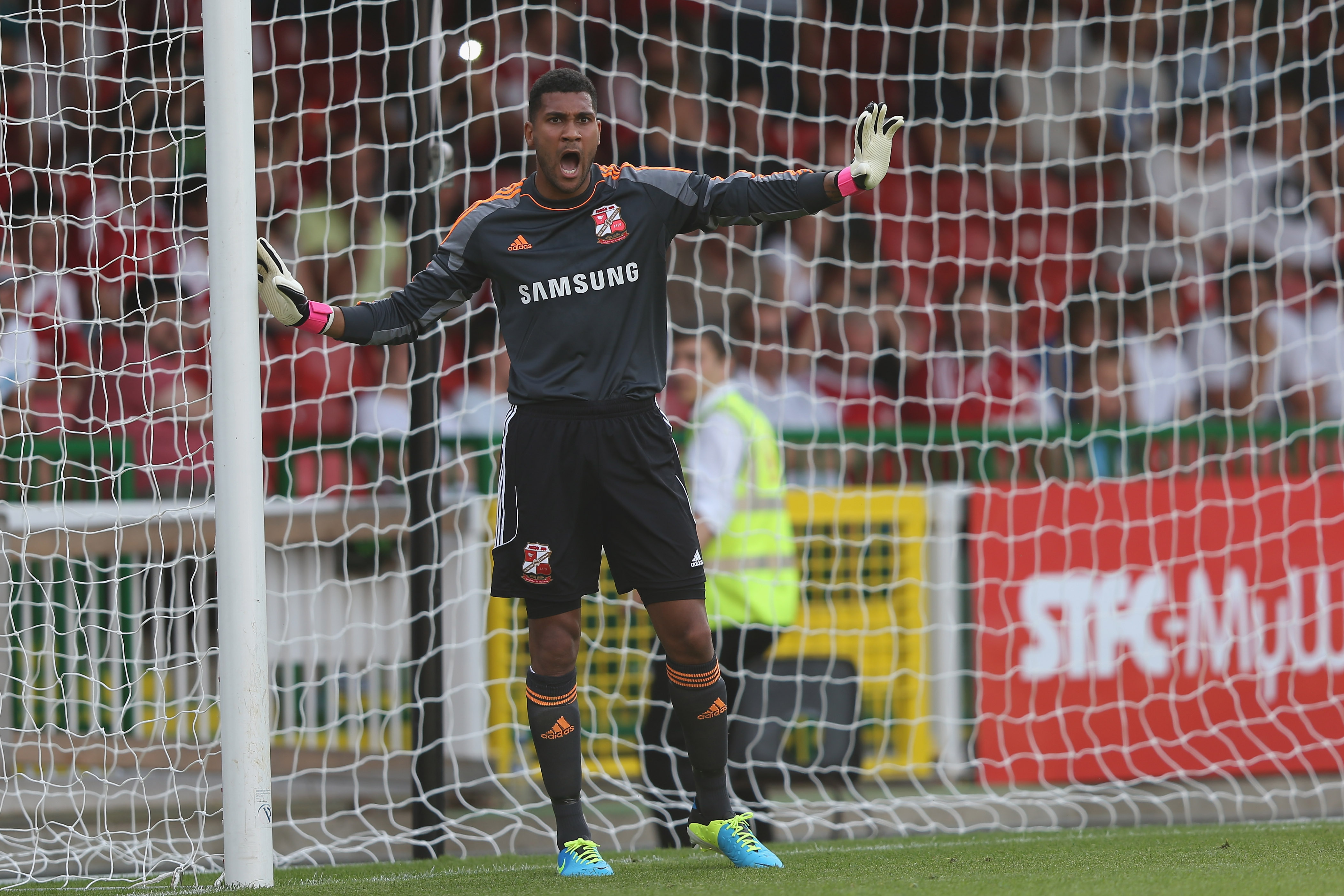SWINDON, ENGLAND - JULY 16:  Wes Foderingham of Swindon in action during the pre season friendly between Tottenham Hotspur and Swindon Town at  the County Ground on July 16, 2013 in Swindon, England.  (Photo by Mark Thompson/Getty Images)