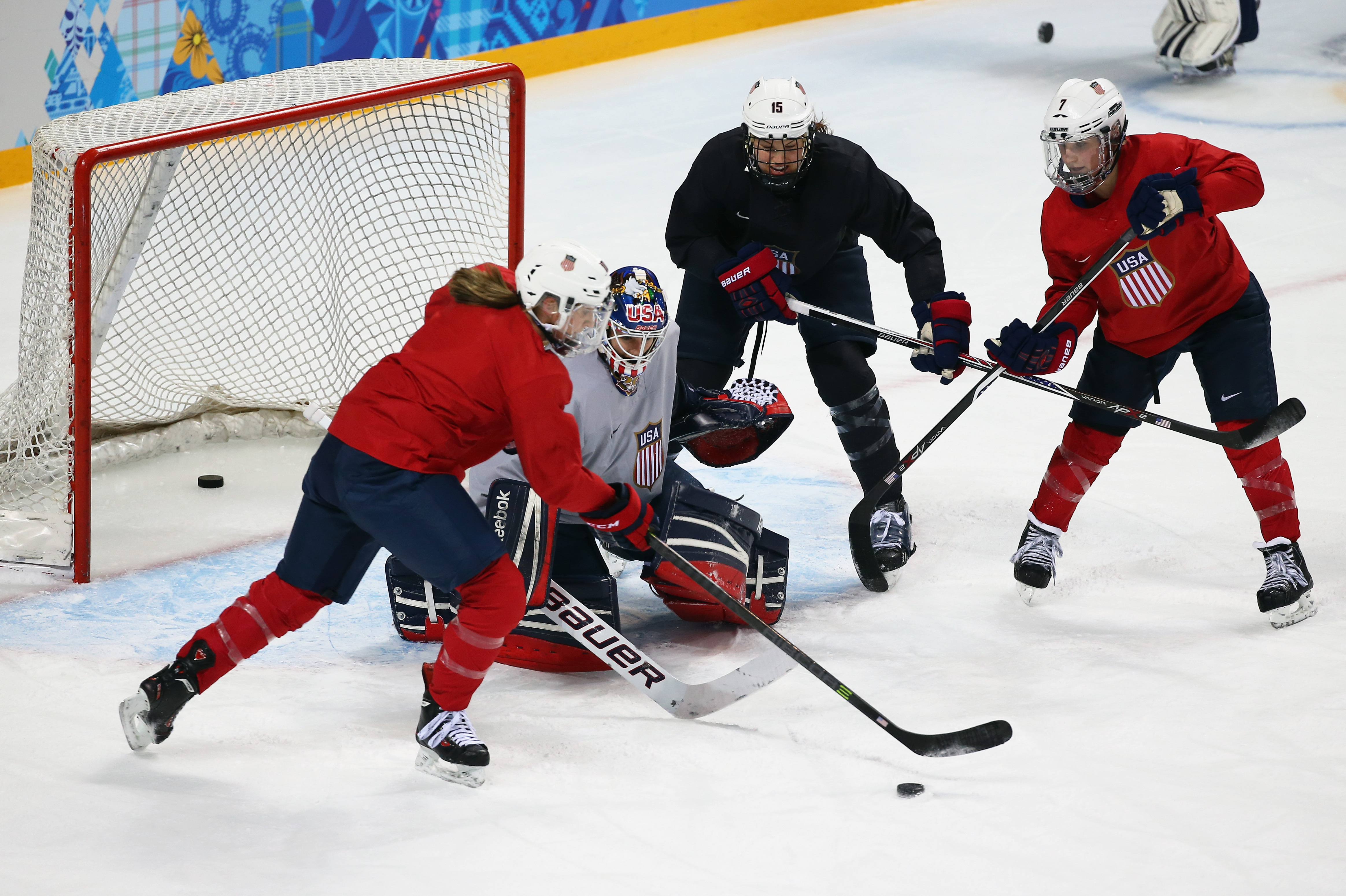 SOCHI, RUSSIA - FEBRUARY 03:  Brianne McLaughlin of the United States women's ice hockey team attempts to make a save during a training session ahead of the Sochi 2014 Winter Olympics at Shayba Arena on February 3, 2014 in Sochi, Russia.  (Photo by Martin Rose/Getty Images)