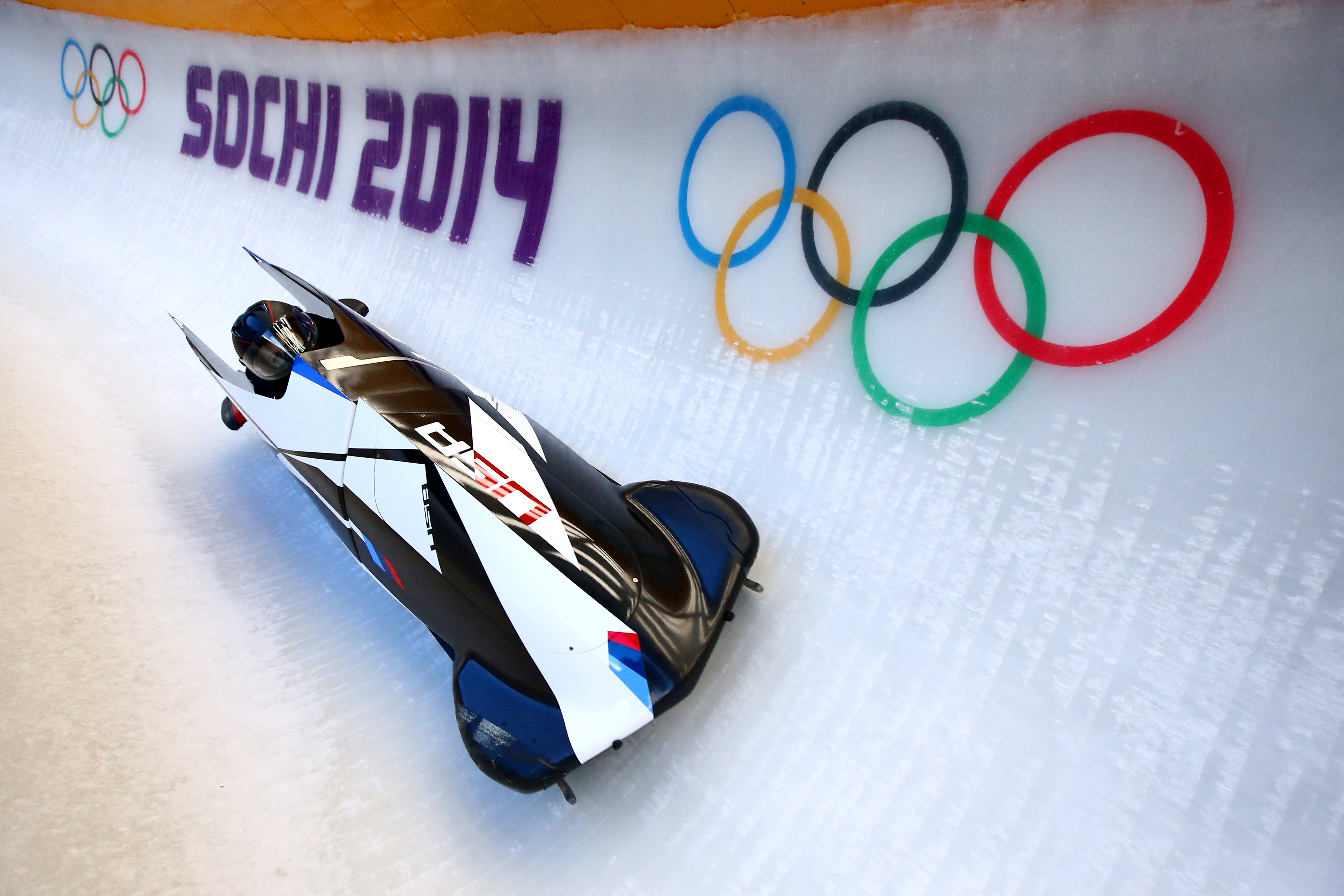 SOCHI, RUSSIA - FEBRUARY 05:  Aja Evans and Elana Meyers of the United States practice a bobsleigh run ahead of the Sochi 2014 Winter Olympics at the Sanki Sliding Center on February 5, 2014 in Sochi, Russia.  (Photo by Al Bello/Getty Images)