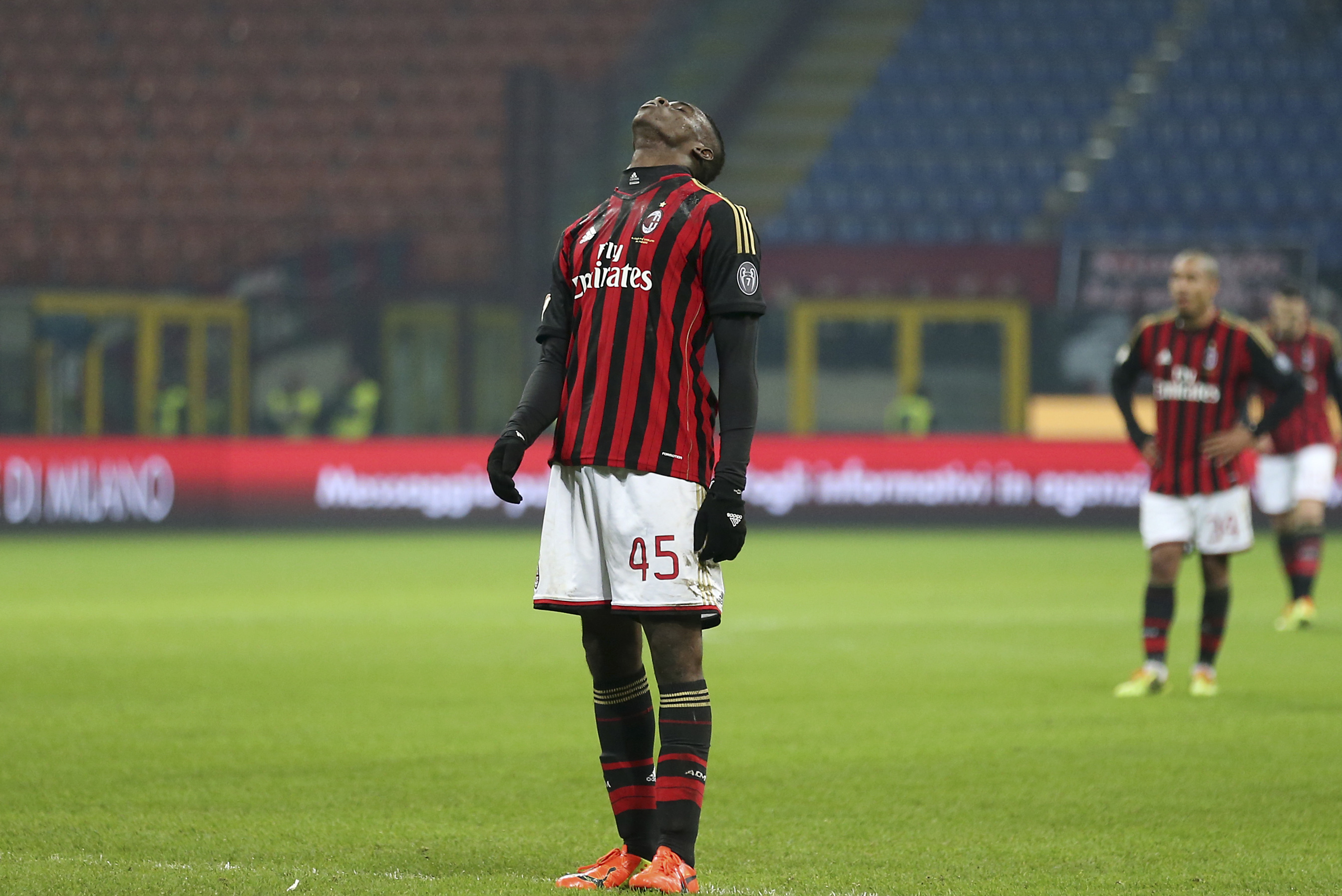 AC Milan forward Mario Balotelli looks up after missing a scoring chance during the Italian Cup soccer match between AC Milan and Udinese at the San Siro stadium in Milan, Italy, Wednesday, Jan. 22, 2014. (AP Photo/Antonio Calanni)
