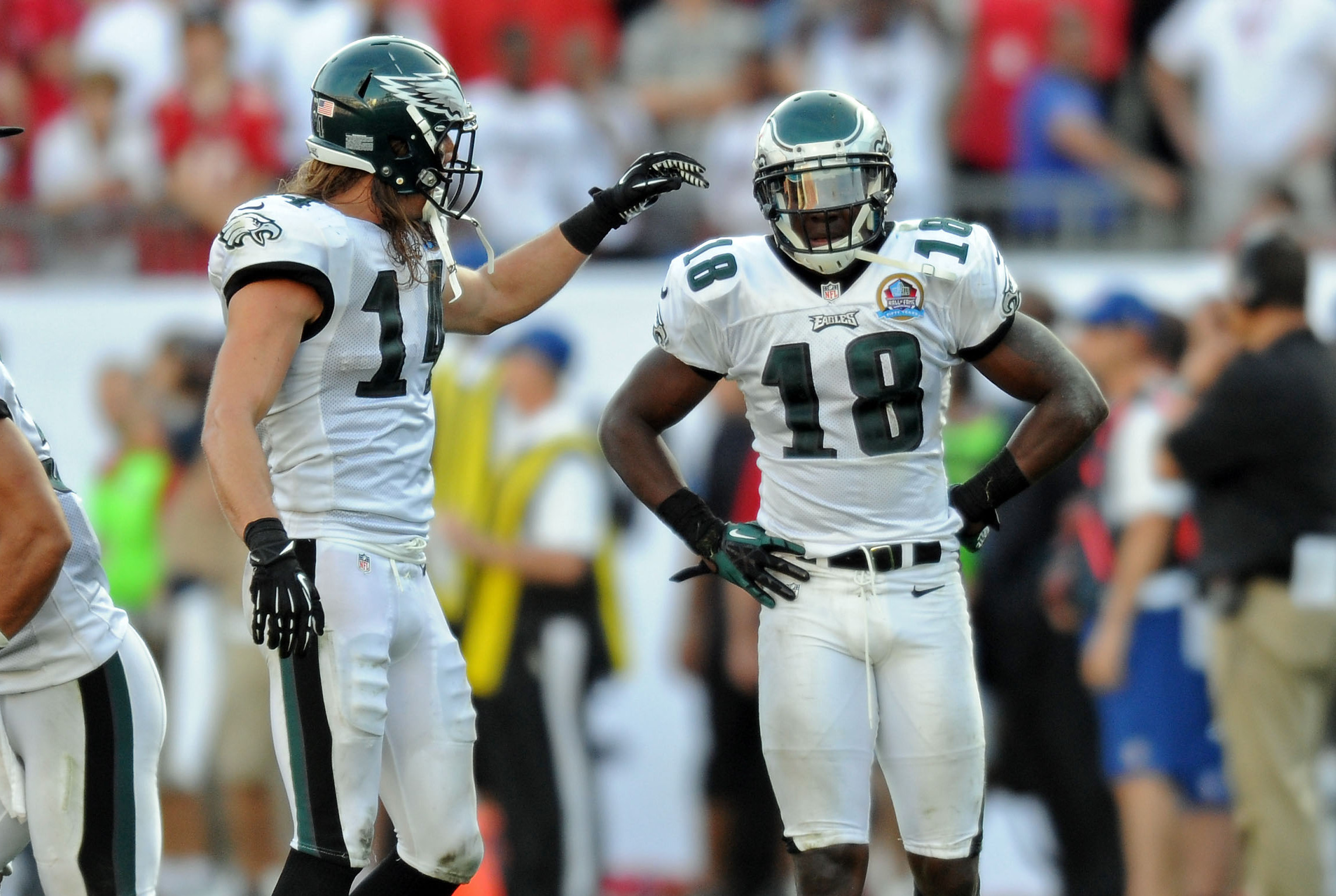 Dec 9, 2012; Tampa FL, USA; Philadelphia Eagles wide receiver Jeremy Maclin (18) and wide receiver Riley Cooper (14) during a game against the Tampa Bay Buccaneers at Raymond James Stadium. Mandatory Credit: Steve Mitchell-USA TODAY Sports