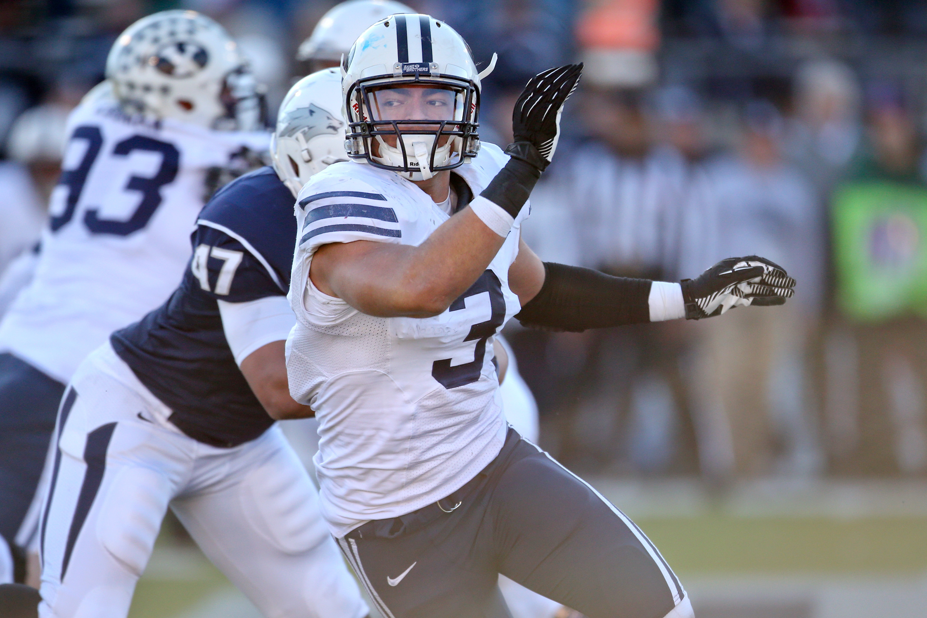 BYU linebacker Kyle Van Noy competes in an NCAA college football game against Nevada, in Reno, Nev., on Saturday, Nov. 30, 2013. (AP Photo/Cathleen Allison)