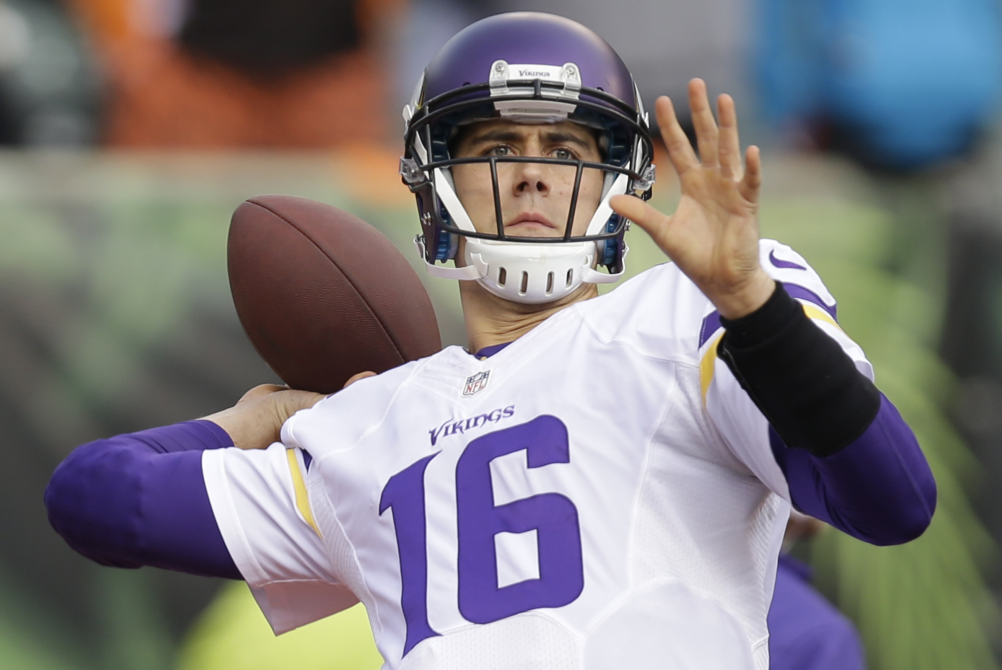 Minnesota Vikings quarterback Matt Cassel warms up prior to an NFL football game against the Cincinnati Bengals, Sunday, Dec. 22, 2013, in Cincinnati. (AP Photo/Al Behrman)