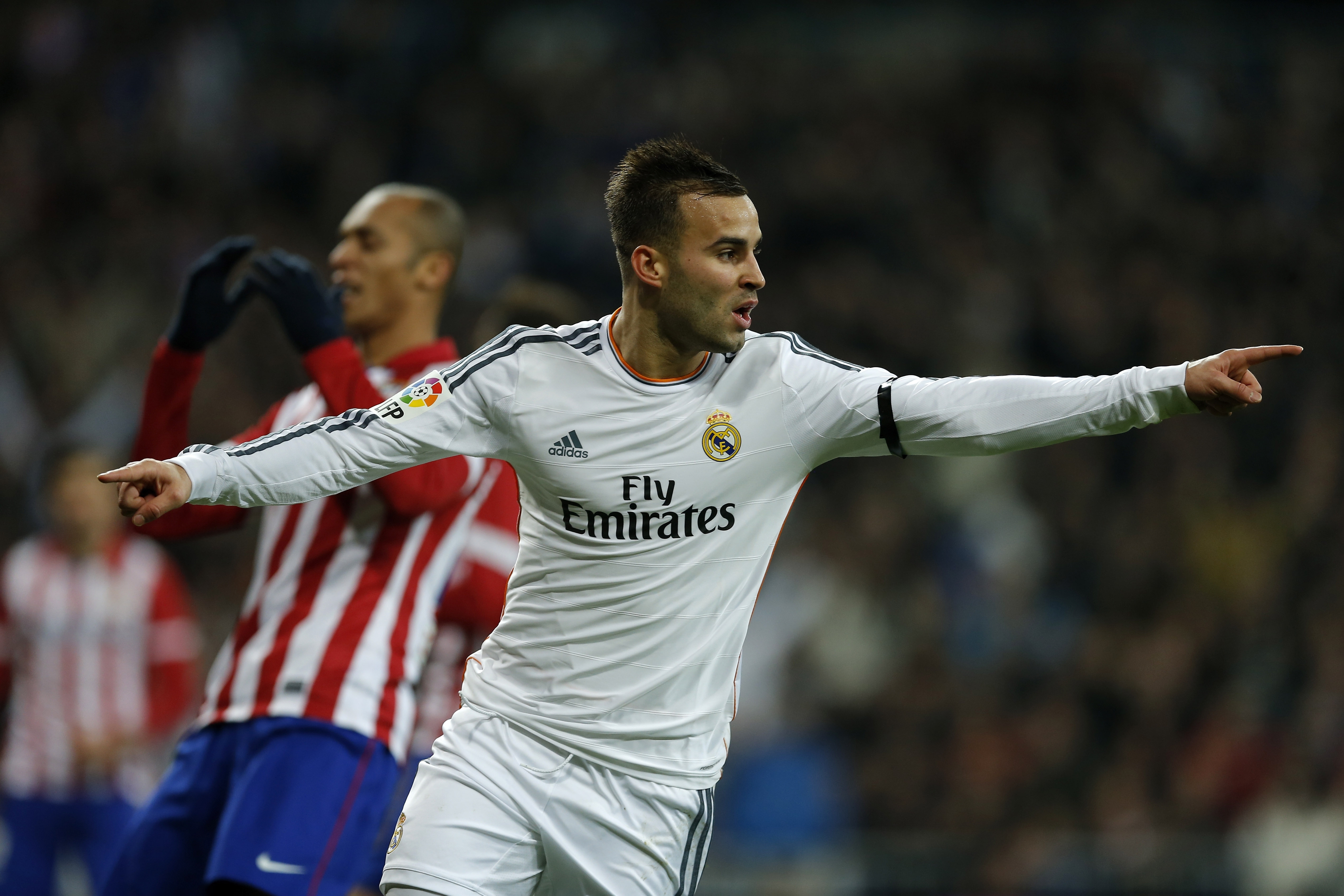 Real's Jese Rodriguez celebrates after scoring during a semi final, 1st leg, Copa del Rey soccer derby match between Real Madrid and Atletico Madrid at the Santiago Bernabeu Stadium in Madrid, Wednesday Feb. 5, 2014.  (AP Photo/Paul White)
