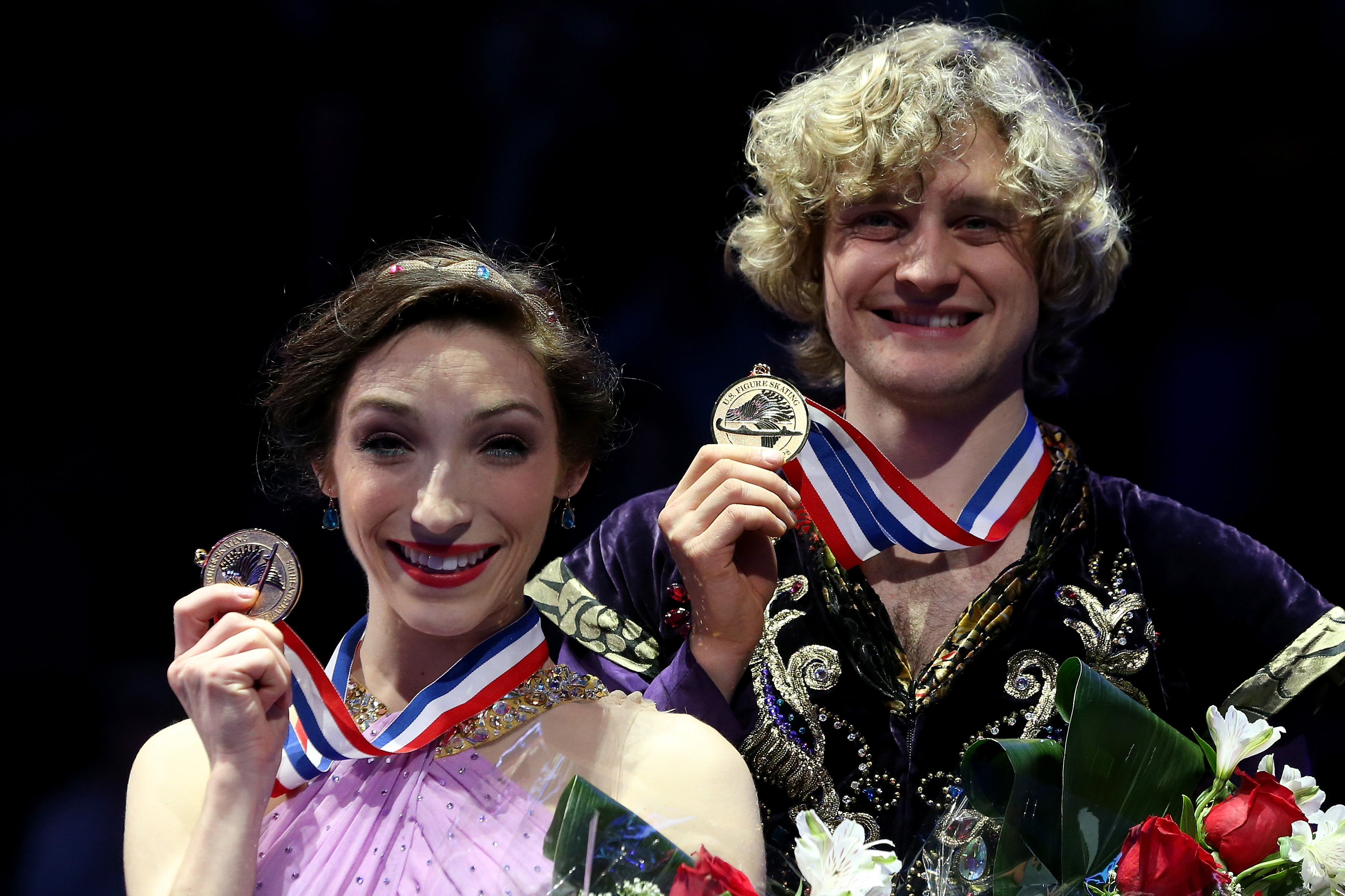 BOSTON, MA - JANUARY 11:  Meryl Davis and Charlie White pose for photographers during the medals ceremony for the dance competition at the Prudential U.S. Figure Skating Championships at TD Garden on January 11, 2014 in Boston, Massachusetts.  (Photo by Matthew Stockman/Getty Images)