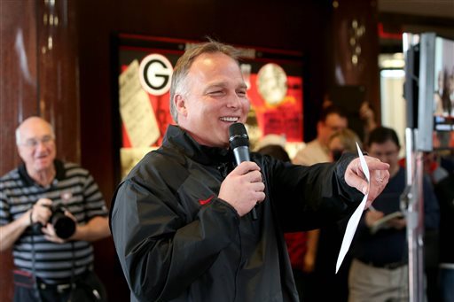 Georgia football coach Mark Richt answers questions from fans about Georgia's recruiting class on national signing day Wednesday, Feb. 5, 2014, in Athens, Ga. (AP Photo/Jason Getz)