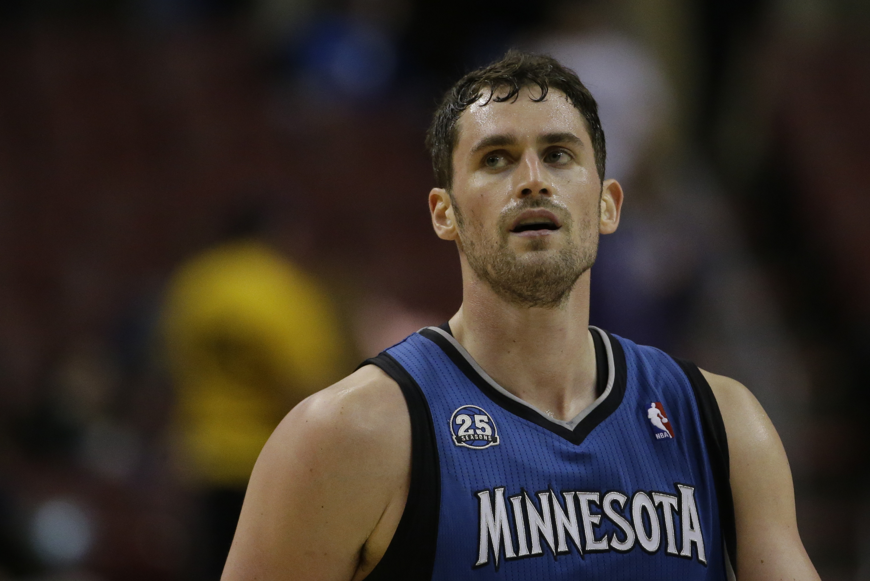 Minnesota Timberwolves' Kevin Love in action an NBA basketball game against the Philadelphia 76ers, Monday, Jan. 6, 2014, in Philadelphia. (AP Photo/Matt Slocum)