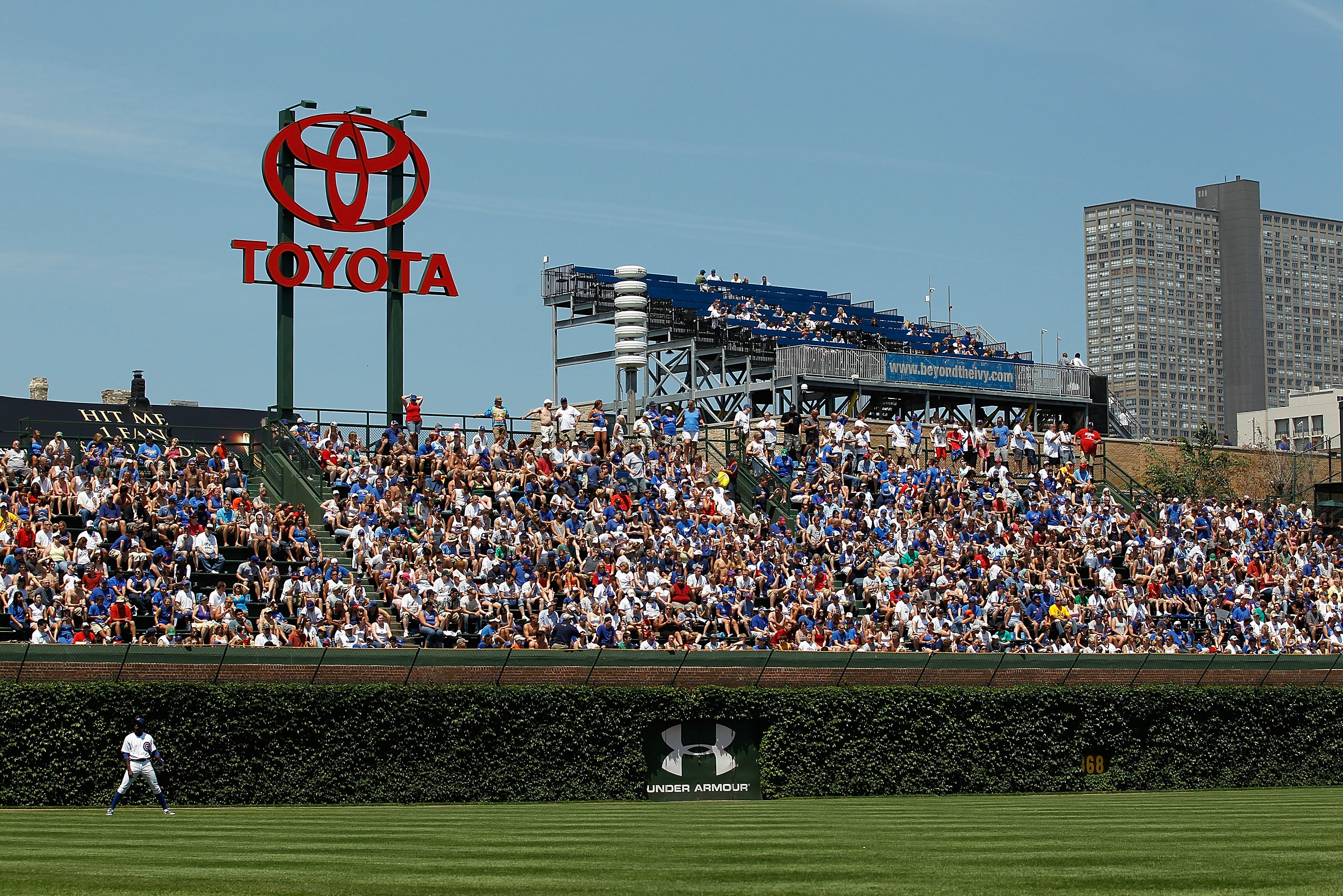 CHICAGO - JUNE 17: A recently installed sign for Toyota Motors appears over the left field wall at Wrigley Field during a game between the Chicago Cubs and the Oakland Athletics on June 17, 2010 in Chicago, Illinois. The Cubs defeated the Athletics 3-2. (Photo by Jonathan Daniel/Getty Images)