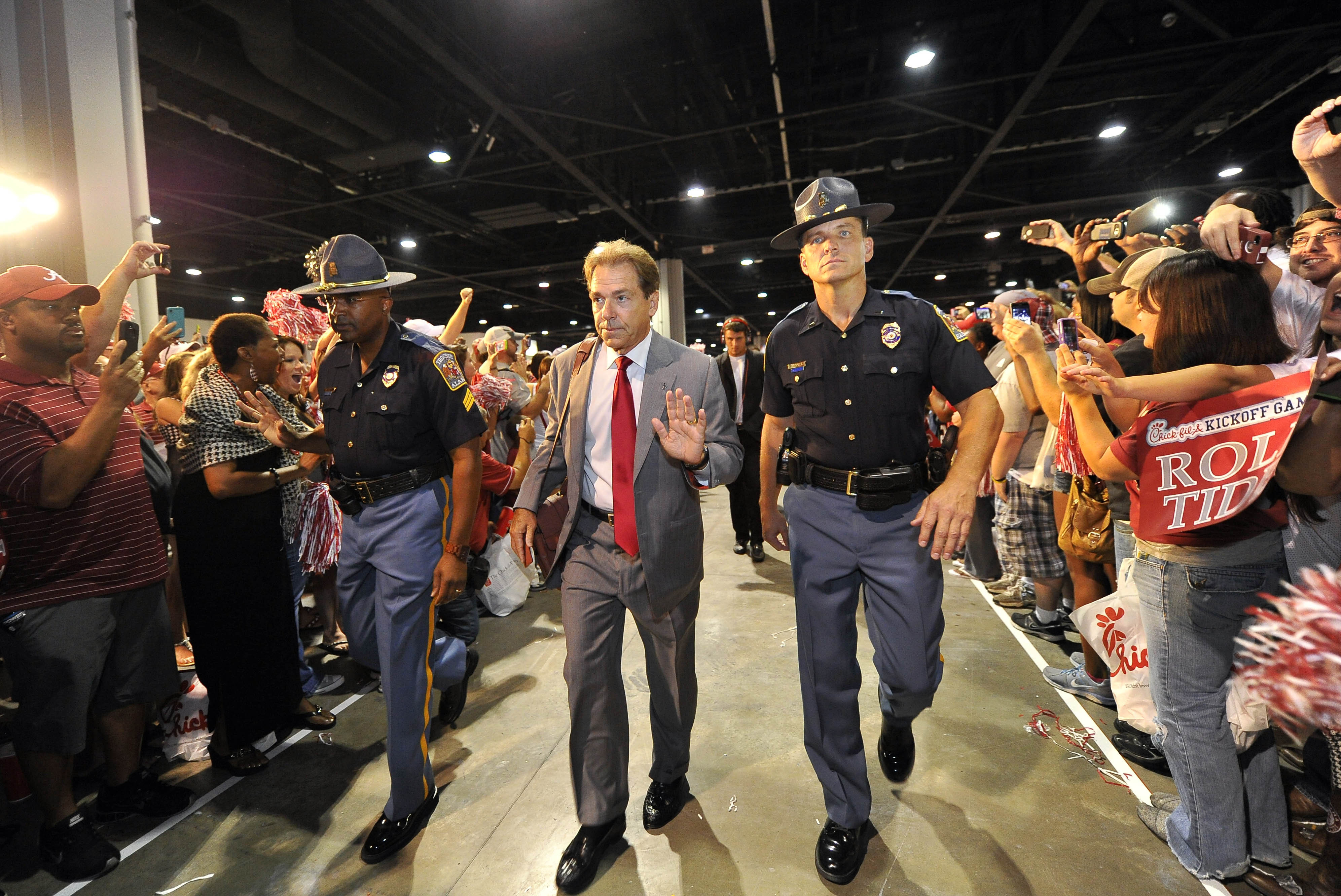 Aug 31, 2013; Atlanta, GA, USA; Alabama Crimson Tide head coach Nick Saban enters the Georgia Dome before the 2013 Chick-fil-A Kickoff game against the Virginia Tech Hokies. Mandatory Credit: Paul Abell-USA TODAY Sports
