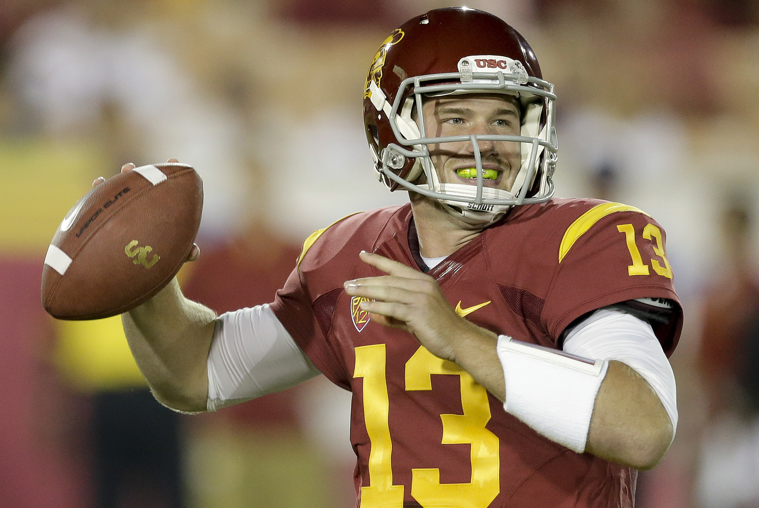 Southern California quarterback Max Wittek throws against Washington State during the second half of an NCAA college football game in Los Angeles, Saturday, Sept. 7, 2013. (AP Photo/Chris Carlson)