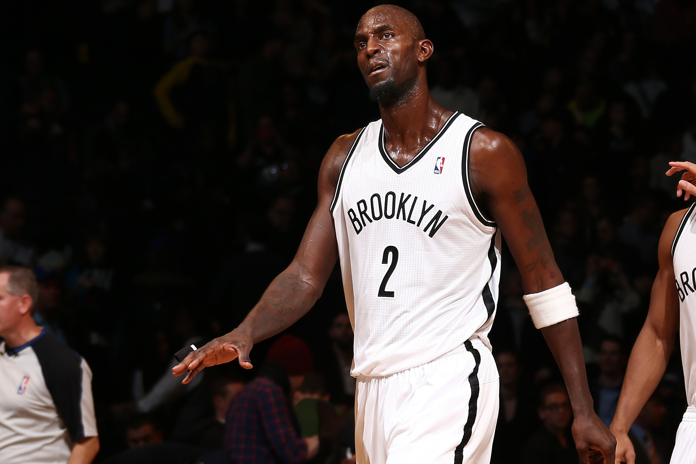 BROOKLYN, NY - FEBRUARY 3: Kevin Garnett #2 of the Brooklyn Nets reacts in a game between the Philadelphia 76ers and the Brooklyn Nets during a game at Barclays Center in Brooklyn. NOTE TO USER: User expressly acknowledges and agrees that, by downloading and or using this photograph, User is consenting to the terms and conditions of the Getty Images License Agreement. Mandatory Copyright Notice: Copyright 2014 NBAE (Photo by Nathaniel S. Butler/NBAE via Getty Images)