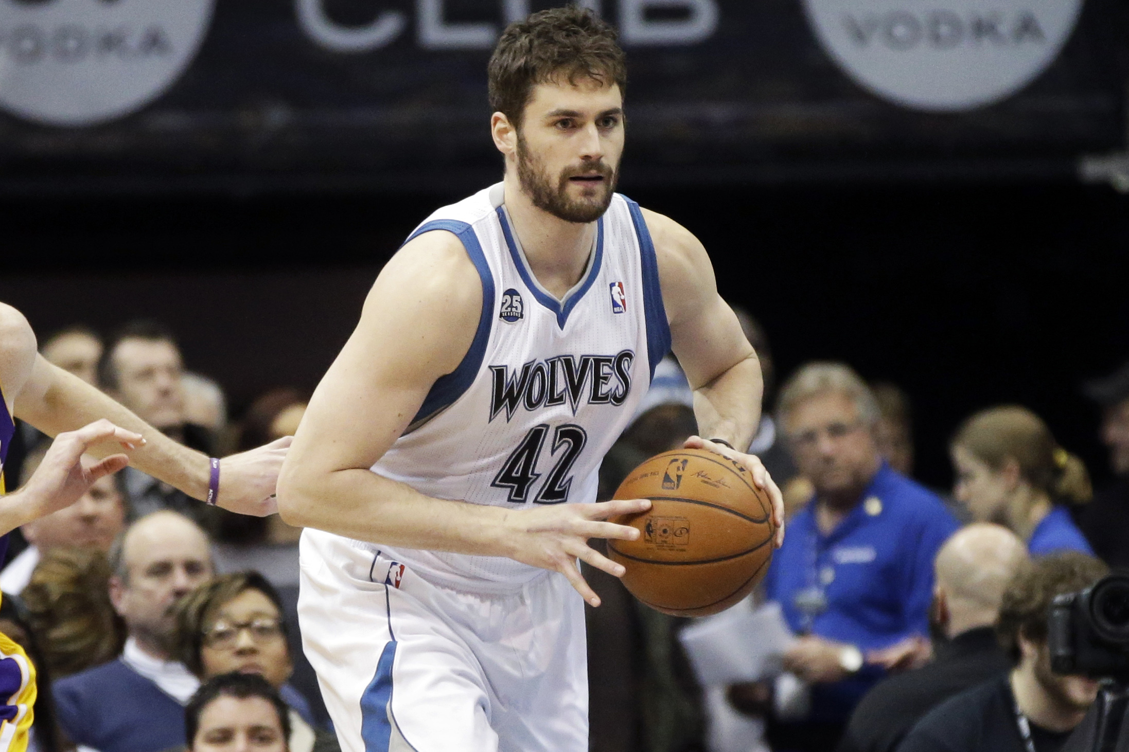 Minnesota Timberwolves' Kevin Love brings in the ball in the second half of an NBA basketball game against the Los Angeles Lakers, Tuesday, Feb. 4, 2014, in Minneapolis. The Timberwolves won 109-99. (AP Photo/Jim Mone)