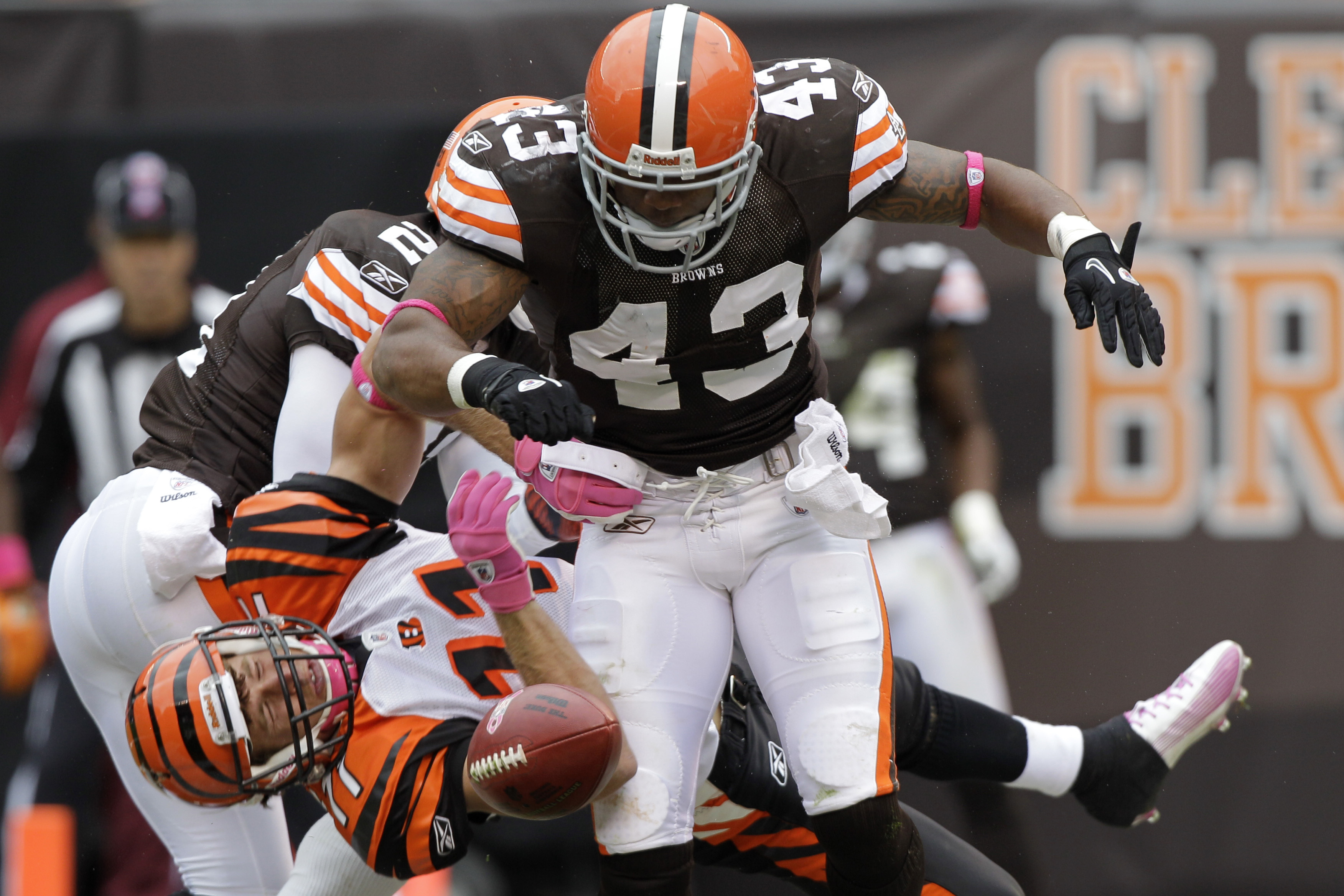 Cincinnati Bengals wide receiver Jordan Shipley loses a pass in the end zone as he is hit by Cleveland Browns safety T.J. Ward (43) in the fourth quarter of an NFL football game Sunday, Oct. 3, 2010, in Cleveland. Ward was called for a personal foul and the Bengals went on to score in their 23-20 loss to the Browns. (AP Photo/Mark Duncan)
