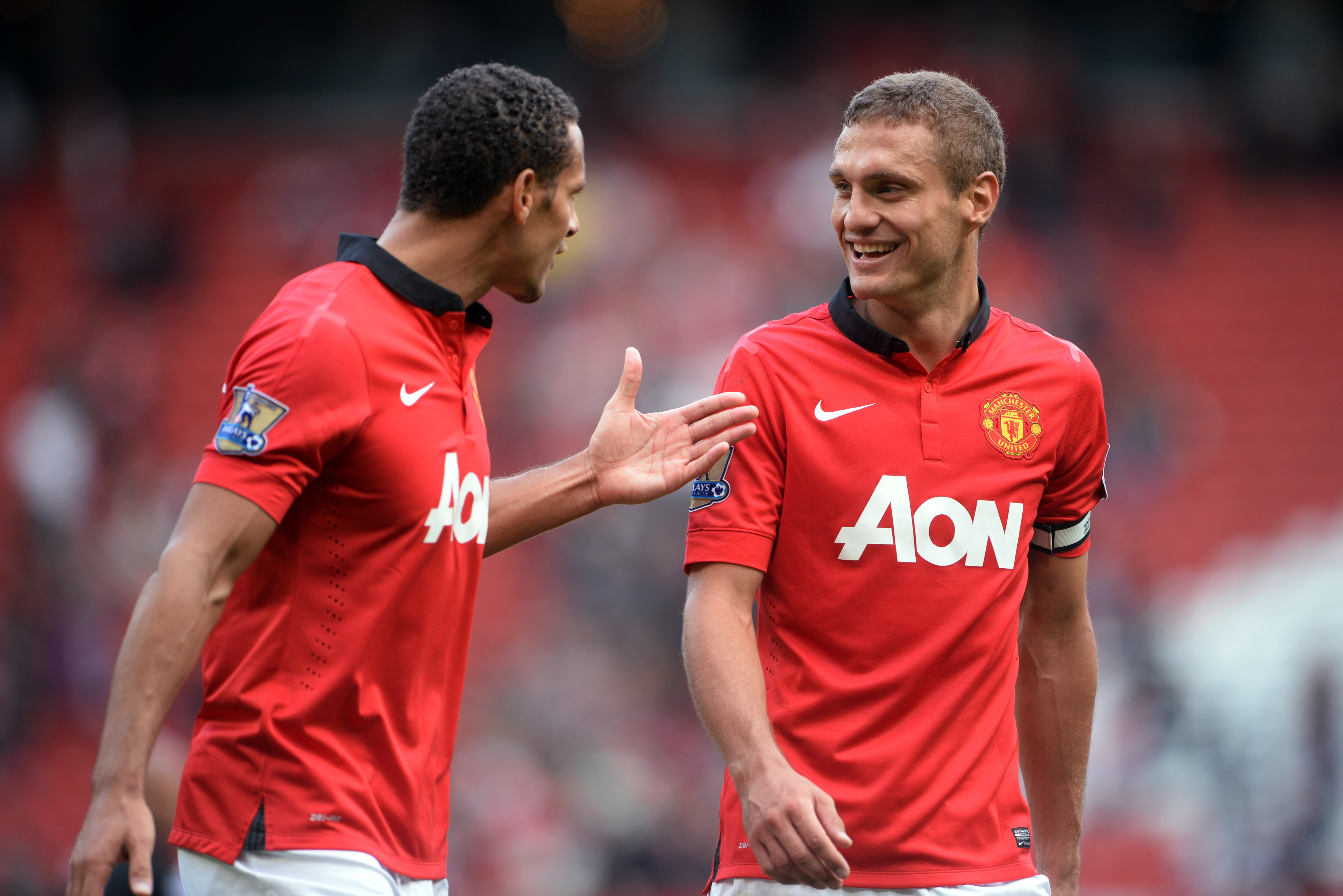MANCHESTER, ENGLAND - SEPTEMBER 14:  Rio Ferdinand and Nemanja Vidic of Manchester United in discussion after the Barclays Premier League match between Manchester United and Crystal Palace at Old Trafford on September 14, 2013 in Manchester, England.  (Photo by Michael Regan/Getty Images)