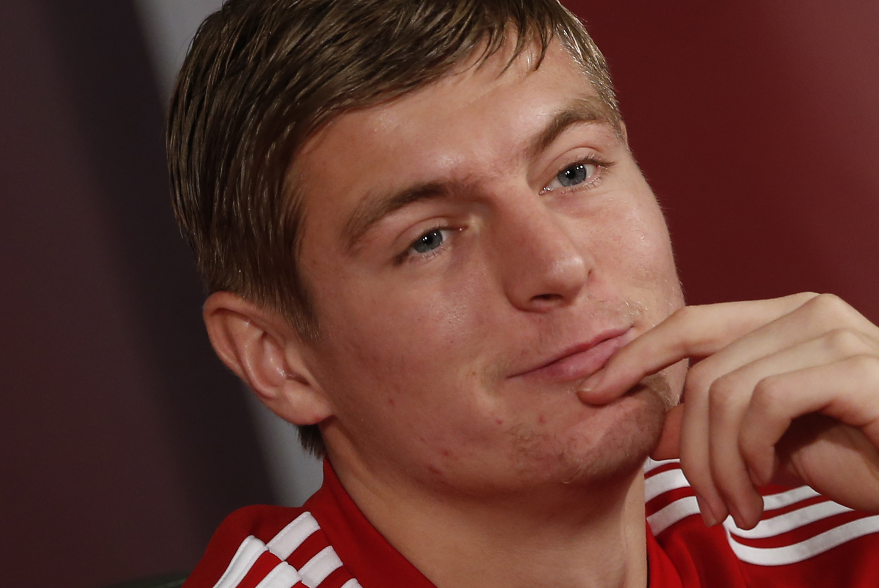 Bayern's Toni Kroos smiles during a news conference at the Club World Cup soccer tournament in Agadir, Morocco, Monday, Dec. 16, 2013. Bayern Munich will face Guangzhou Evergrande in the first semi final on Tuesday, Dec 17. (AP Photo/Matthias Schrader)