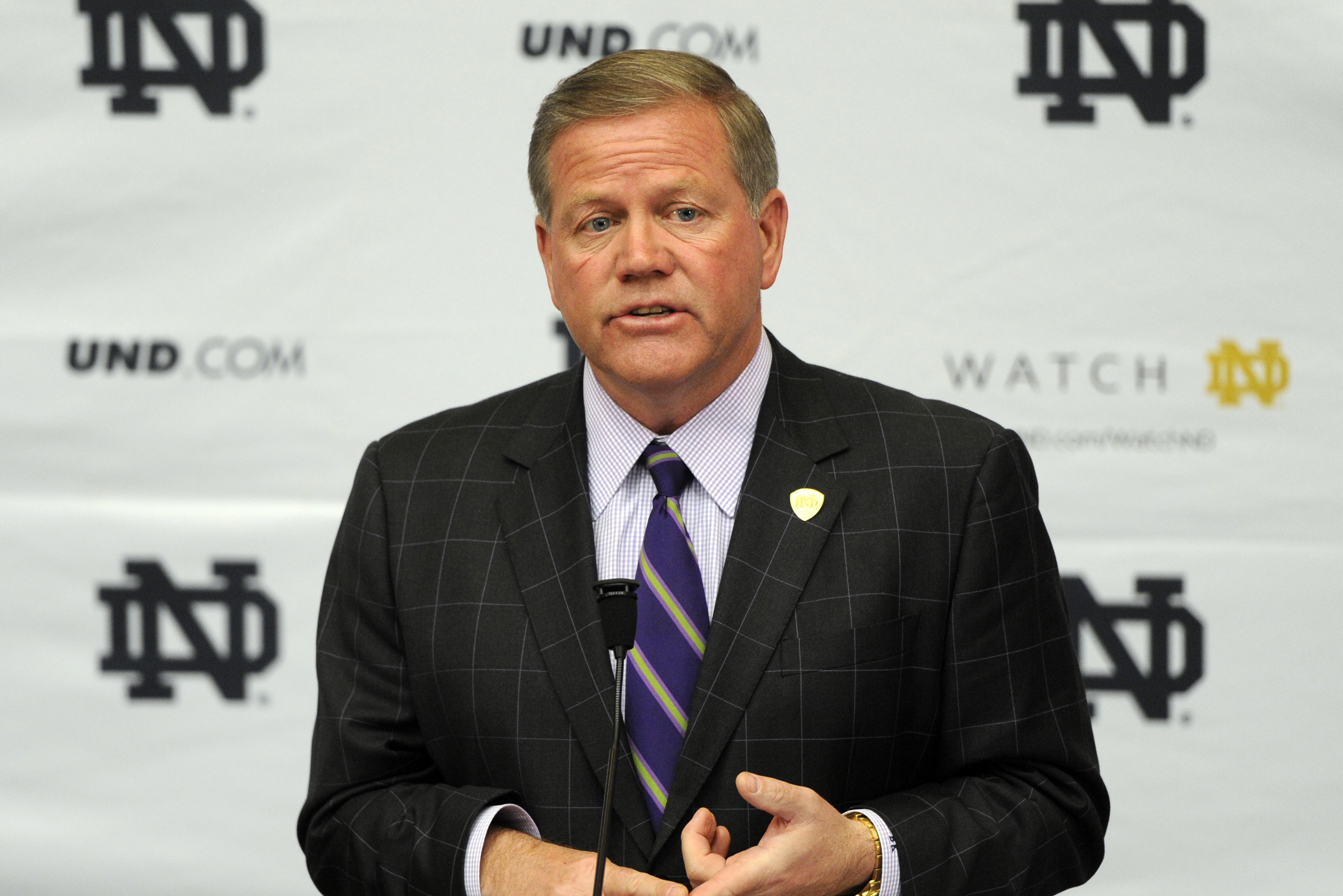 Notre Dame football coach Brian Kelly talks about recruits during football signing day at Notre Dame Feb. 5, 2014 in South Bend, Ind.  (AP Photo/Joe Raymond)