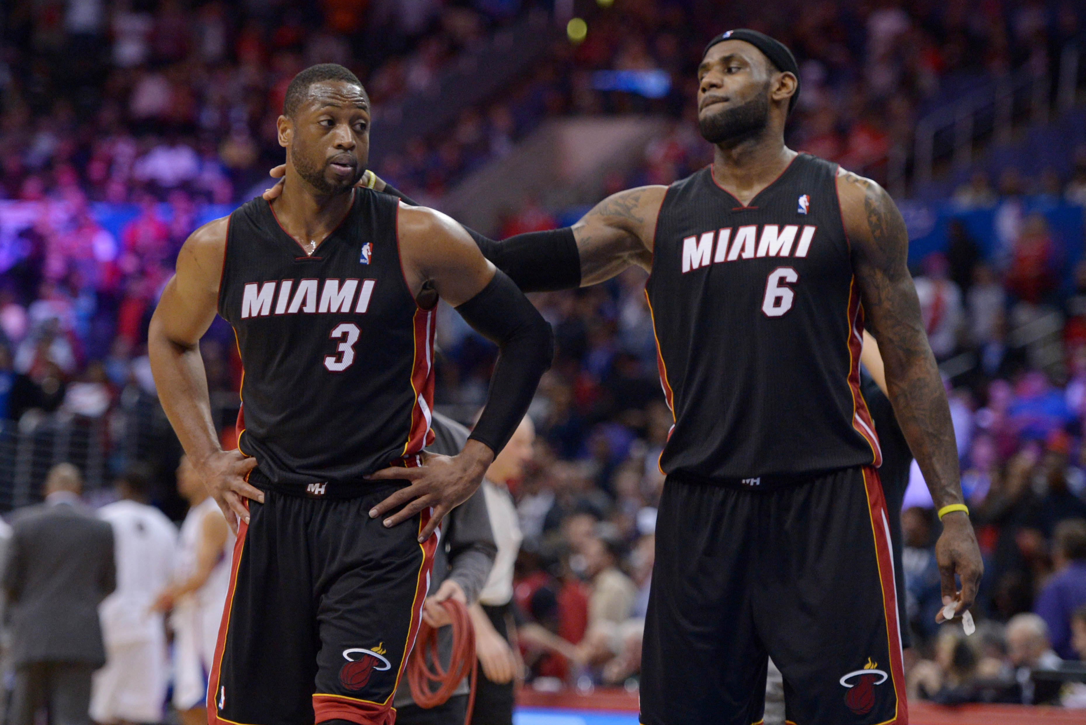 Feb 5, 2014; Los Angeles, CA, USA; Miami Heat guard Dwayne Wade (3) and forward LeBron James (6) in the fourth quarter against the Los Angeles Clippers at Staples Center. The Heat defeated the Clippers 116-112. Mandatory Credit: Kirby Lee-USA TODAY Sports