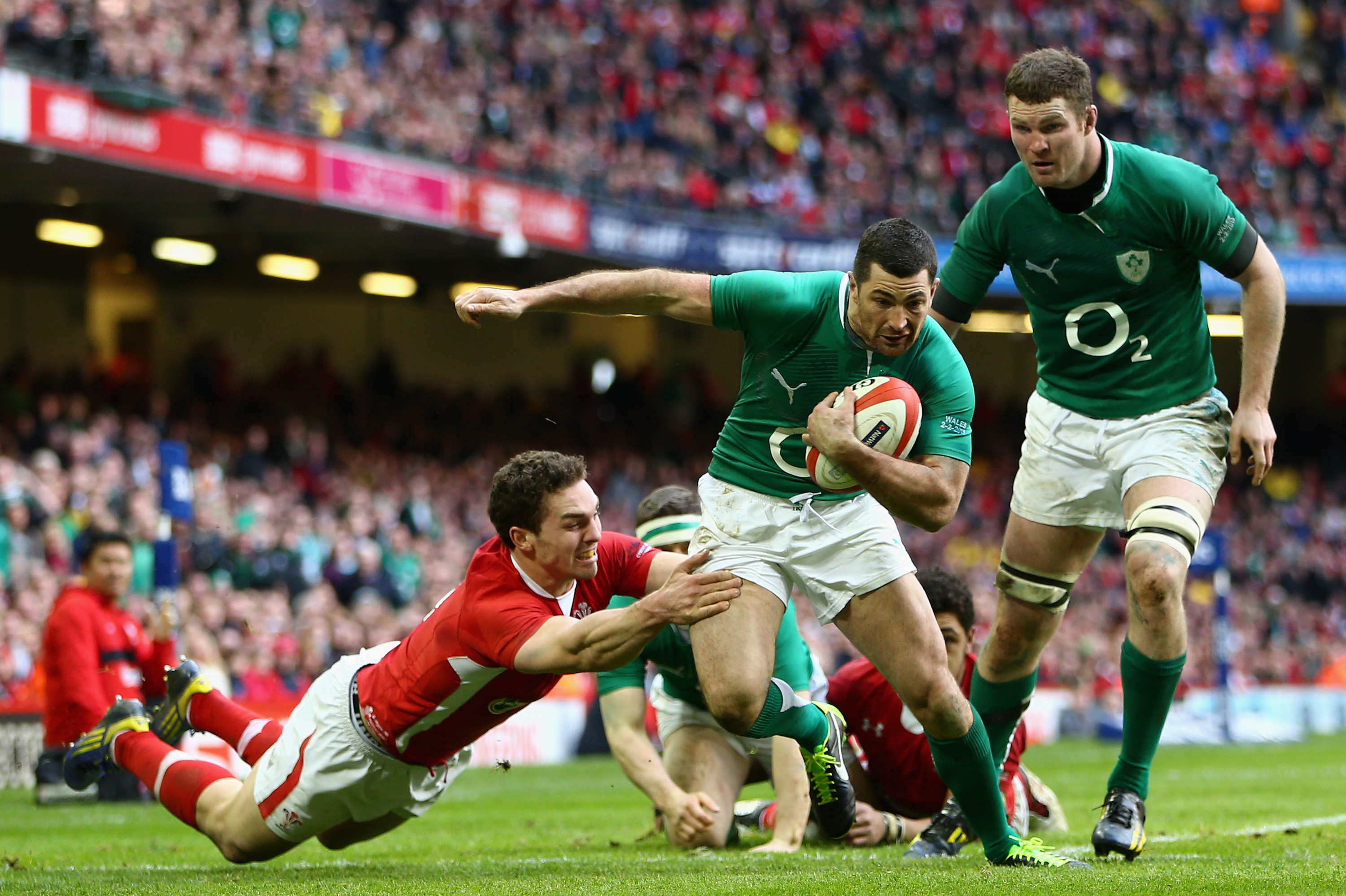 CARDIFF, WALES - FEBRUARY 02:  Rob Kearney of Ireland is tackled by George North of Wales during the RBS Six Nations match between Wales and Ireland at the Millennium Stadium on February 2, 2013 in Cardiff, Wales.  (Photo by Michael Steele/Getty Images)