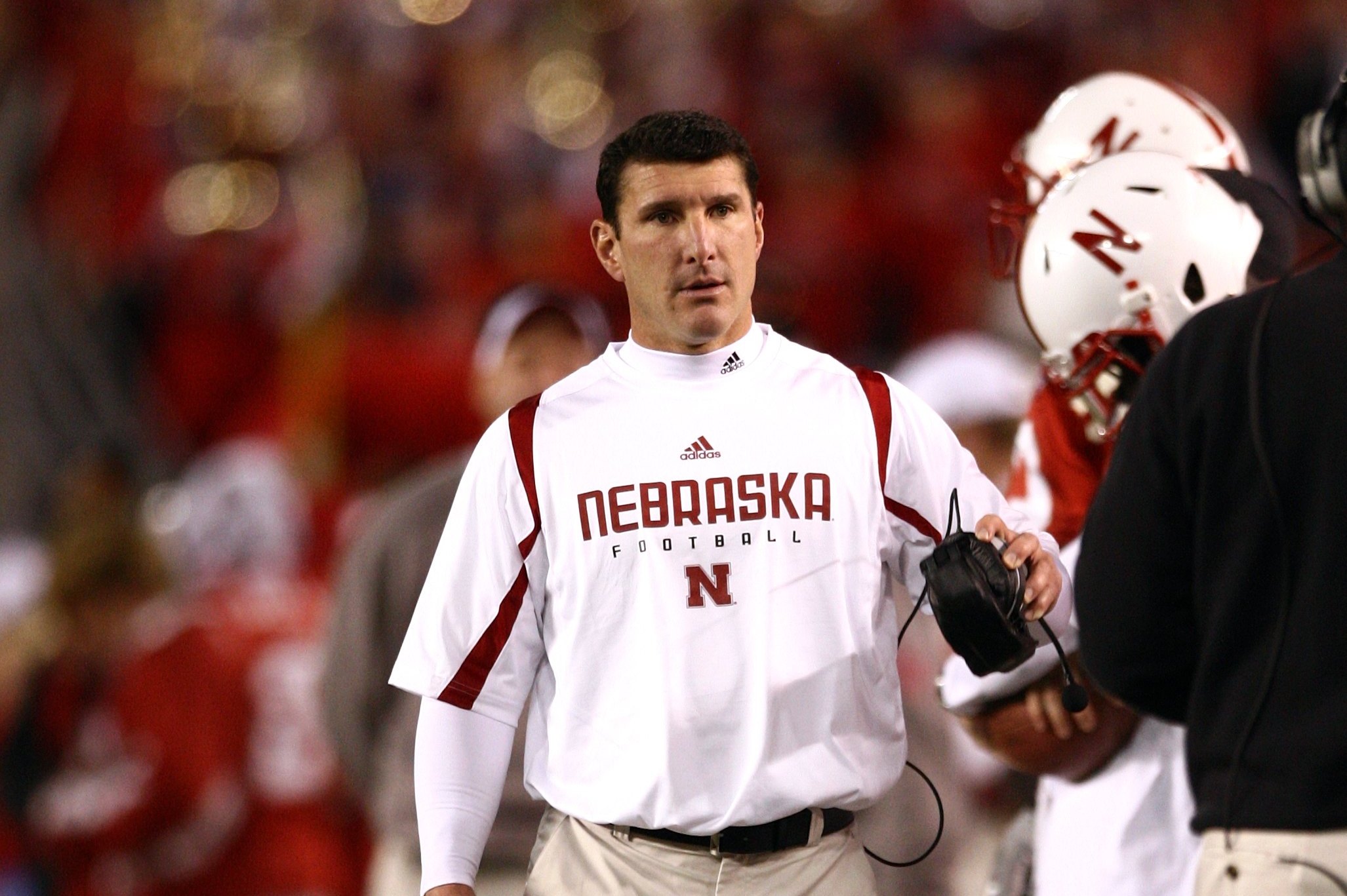 SAN DIEGO - DECEMBER 30:  Linebackers Coach Mike Ekeler of the University of Nebraska Cornhuskers looks on from the sideline during the Pacific Life Holiday Bowl against University of Arizona Wildcats on December 30, 2009 at Qualcomm Stadium in San Diego, California. The Cornhuskers defeated the Wildcats 33-0. (Photo By Donald Miralle/Getty Images)
