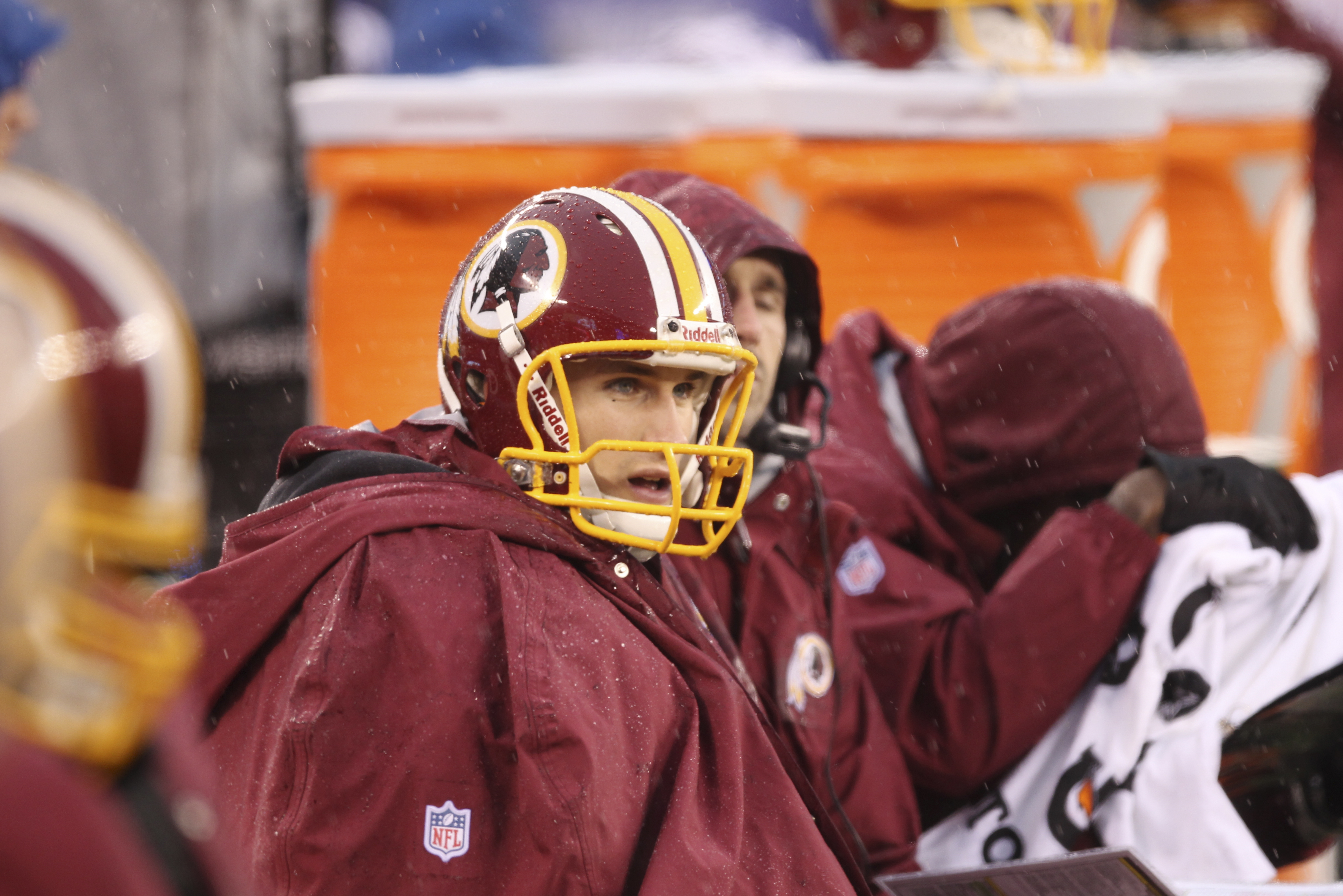 Washington Redskins quarterback Kirk Cousins (12) sits on the bench during the first half of an NFL football game against the New York Giants Sunday, Dec. 29, 2013, in East Rutherford, N.J.  (AP Photo/Peter Morgan)