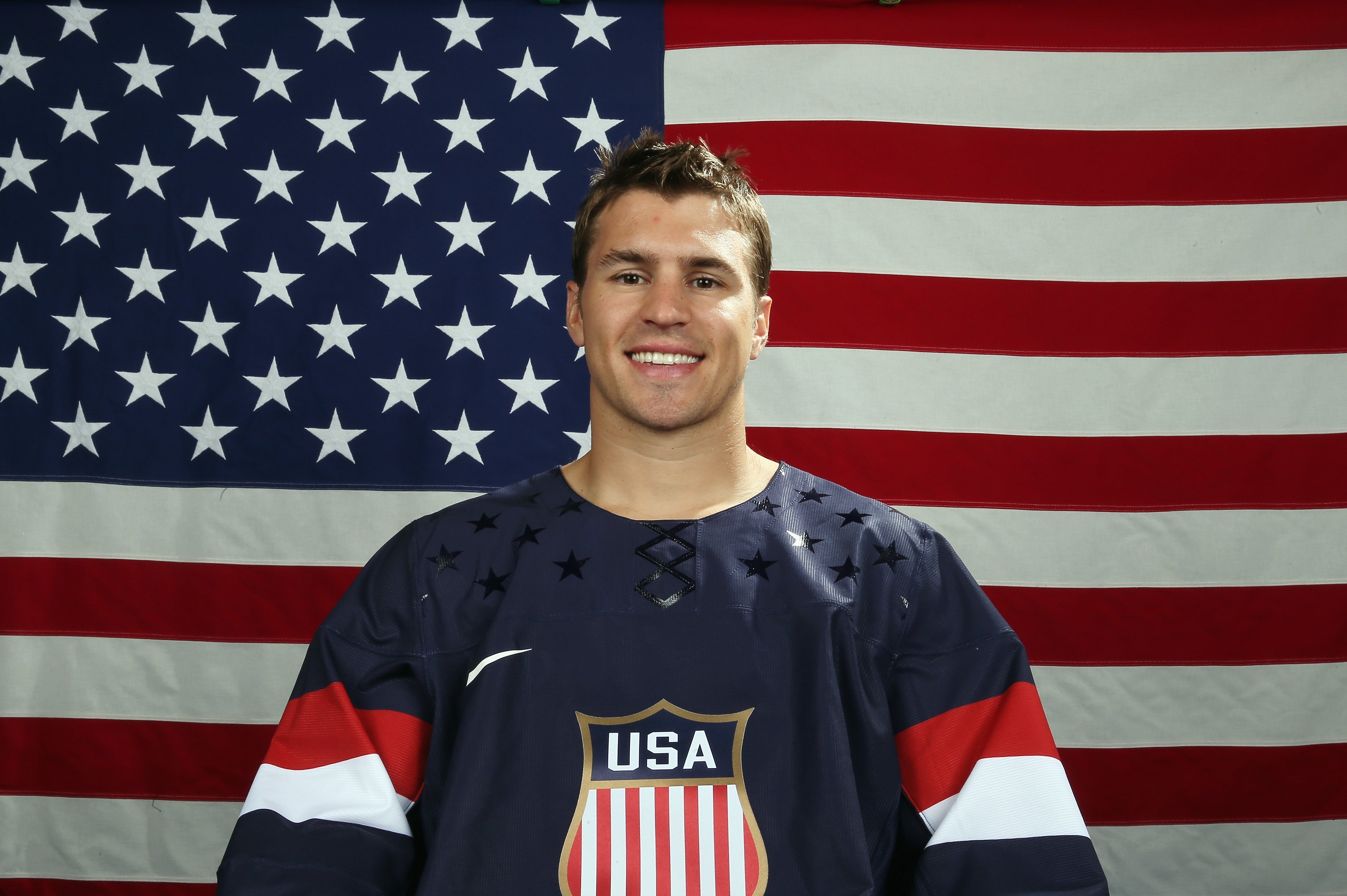 ARLINGTON, VA - AUGUST 26:  Zach Parise poses after being named a candidate for the 2014 USA Hockey Olympic Team at the Kettler Capitals Iceplex on August 26, 2013 in Arlington, Virginia.  (Photo by Bruce Bennett/Getty Images)