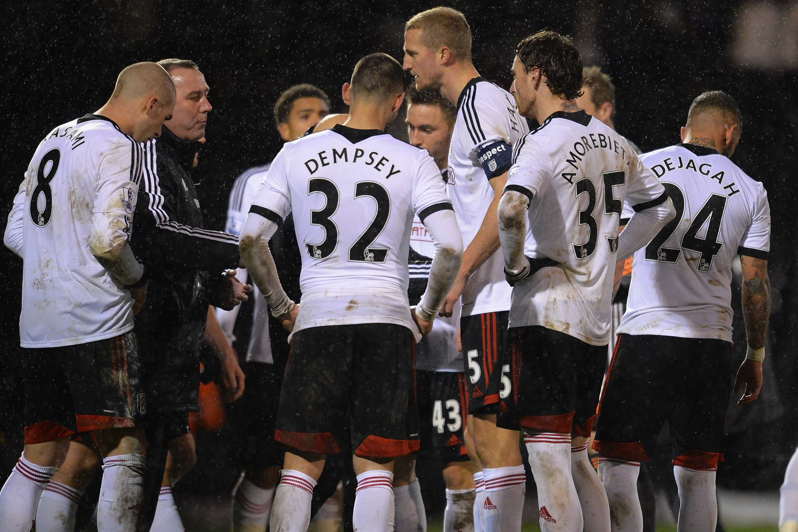 LONDON, ENGLAND - FEBRUARY 04:  Manager Rene Meulensteen of Fulham talks to his players before they go into extra time during the FA Cup Fourth Round Reply match between Fulham and Sheffield United at Craven Cottage on February 4, 2014 in London, England.  (Photo by Christopher Lee/Getty Images)