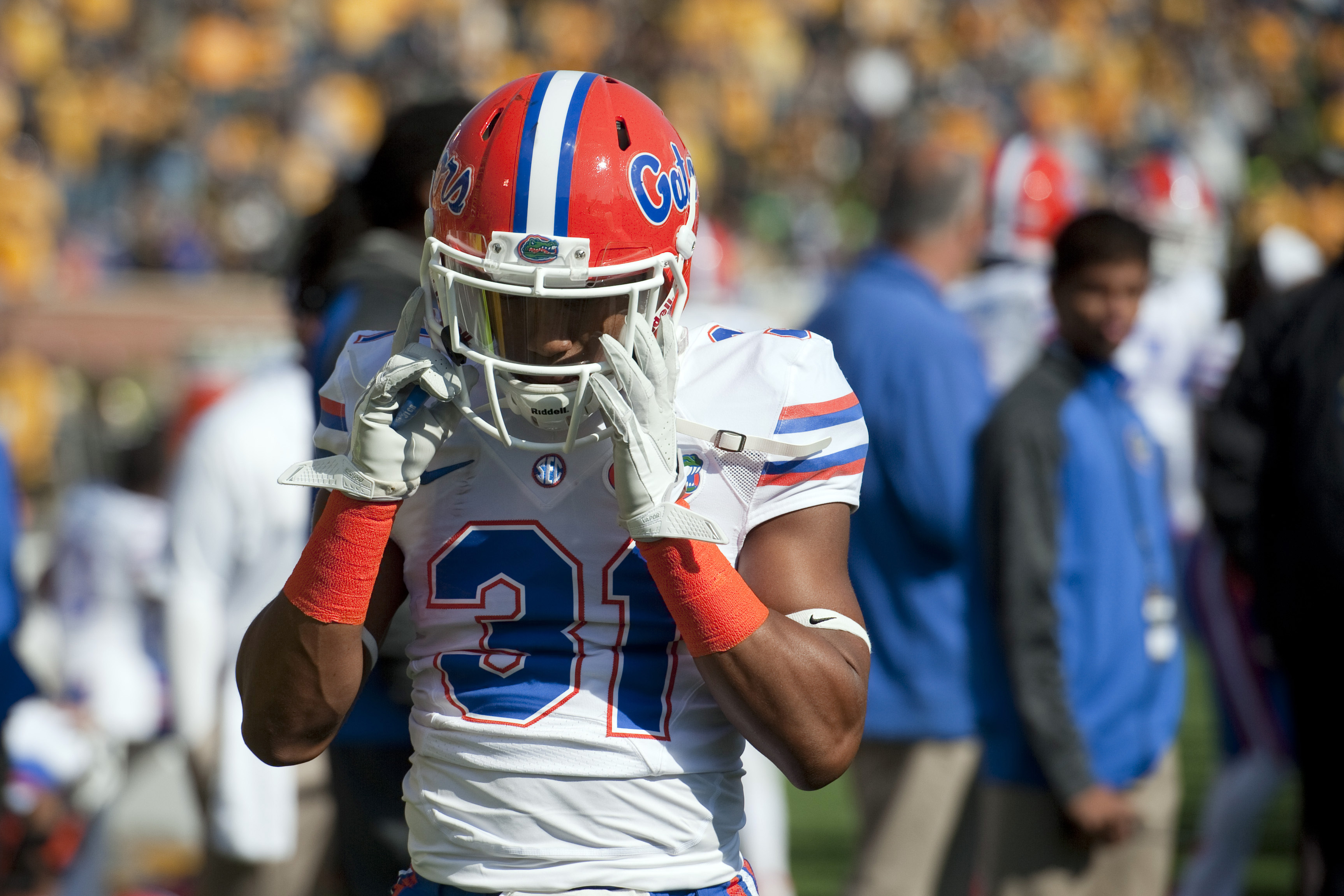Florida's Cody Riggs walks off the field after being charged with targeting and ejected early in the first quarter of an NCAA college football game against Missouri Saturday, Oct. 19, 2013, in Columbia, Mo. Missouri won 36-17. (AP Photo/L.G. Patterson)